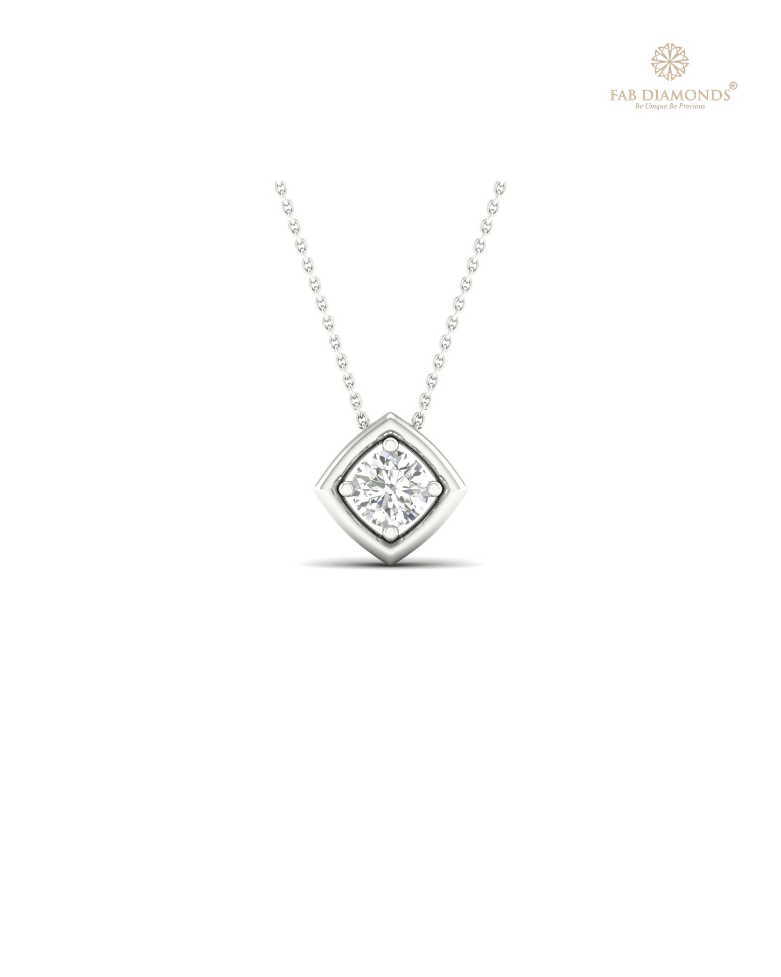 The PS00437 Floating Solitaire Diamond Pendant (0.20 Cts) on white atelier plate with FAB hallmark