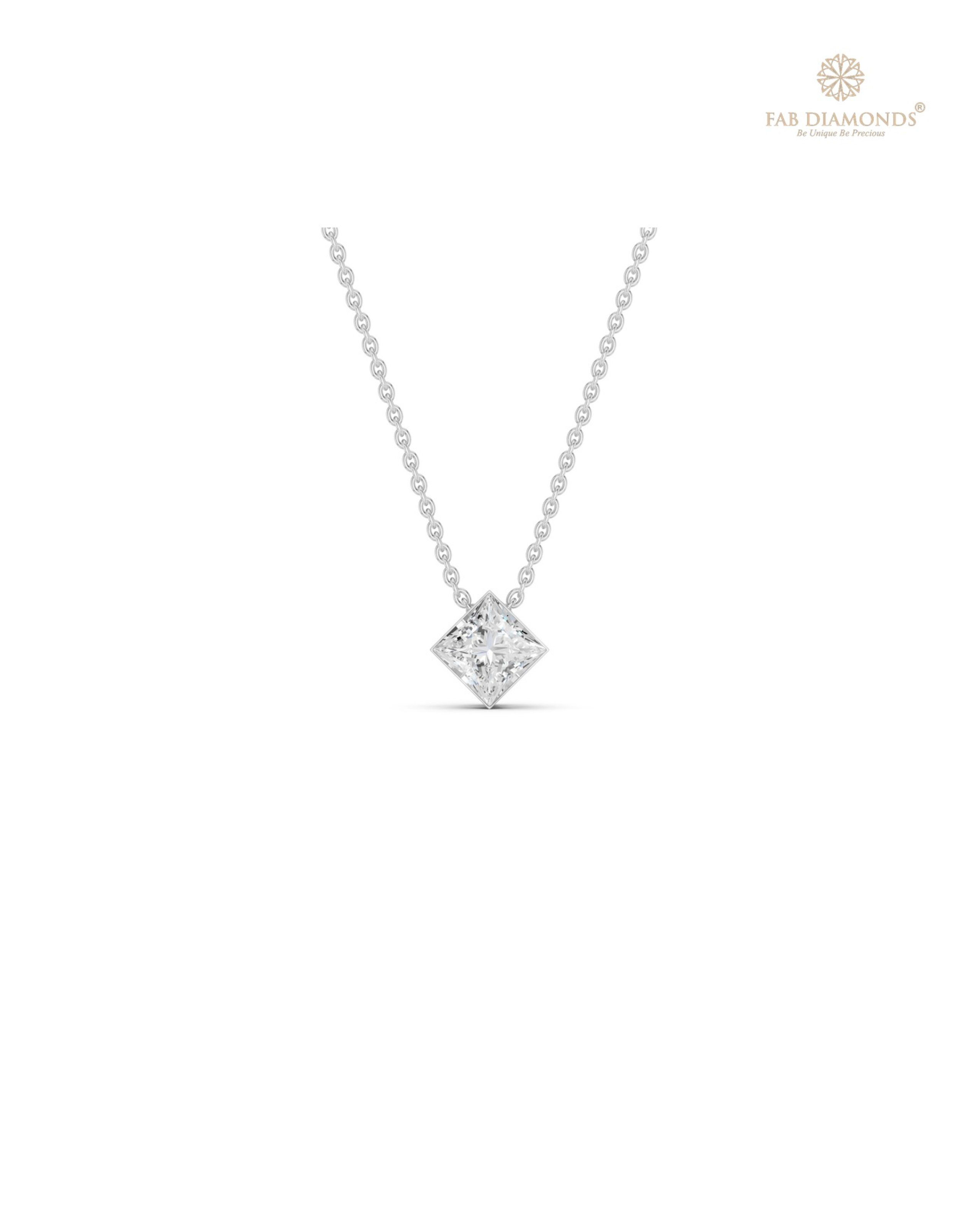 The PS00629 Floating Solitaire Diamond Pendant (0.27 Cts) on white atelier plate with FAB hallmark