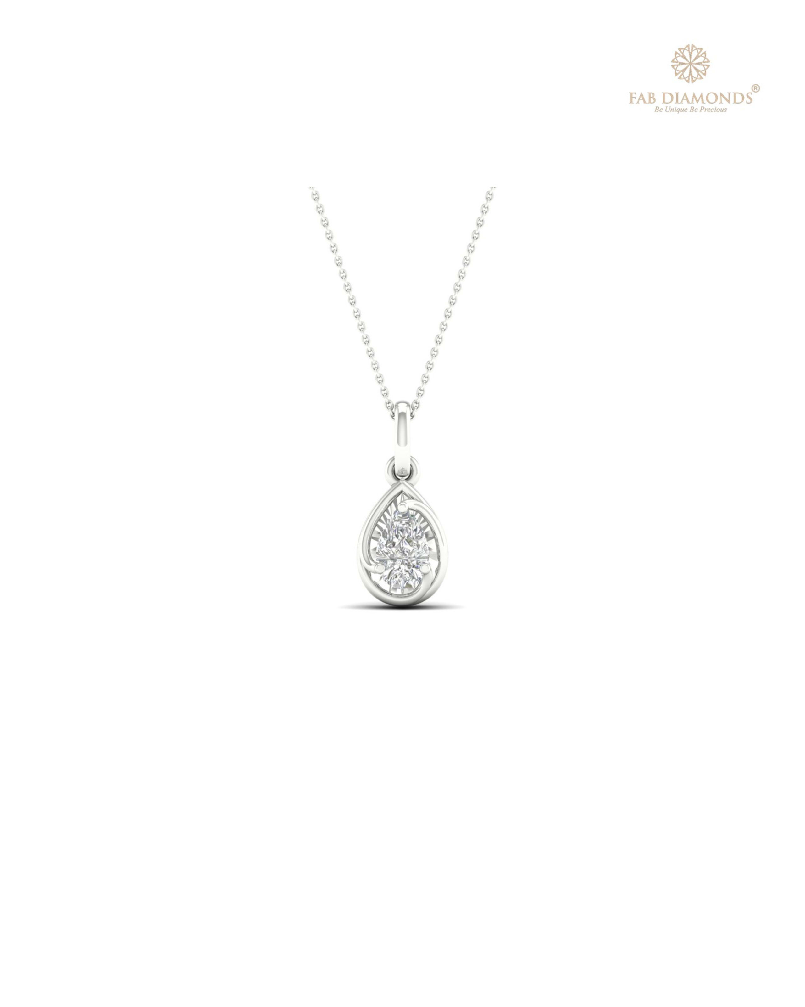 The PS01012 Floating Solitaire Diamond Pendant (0.27 Cts) on white atelier plate with FAB hallmark