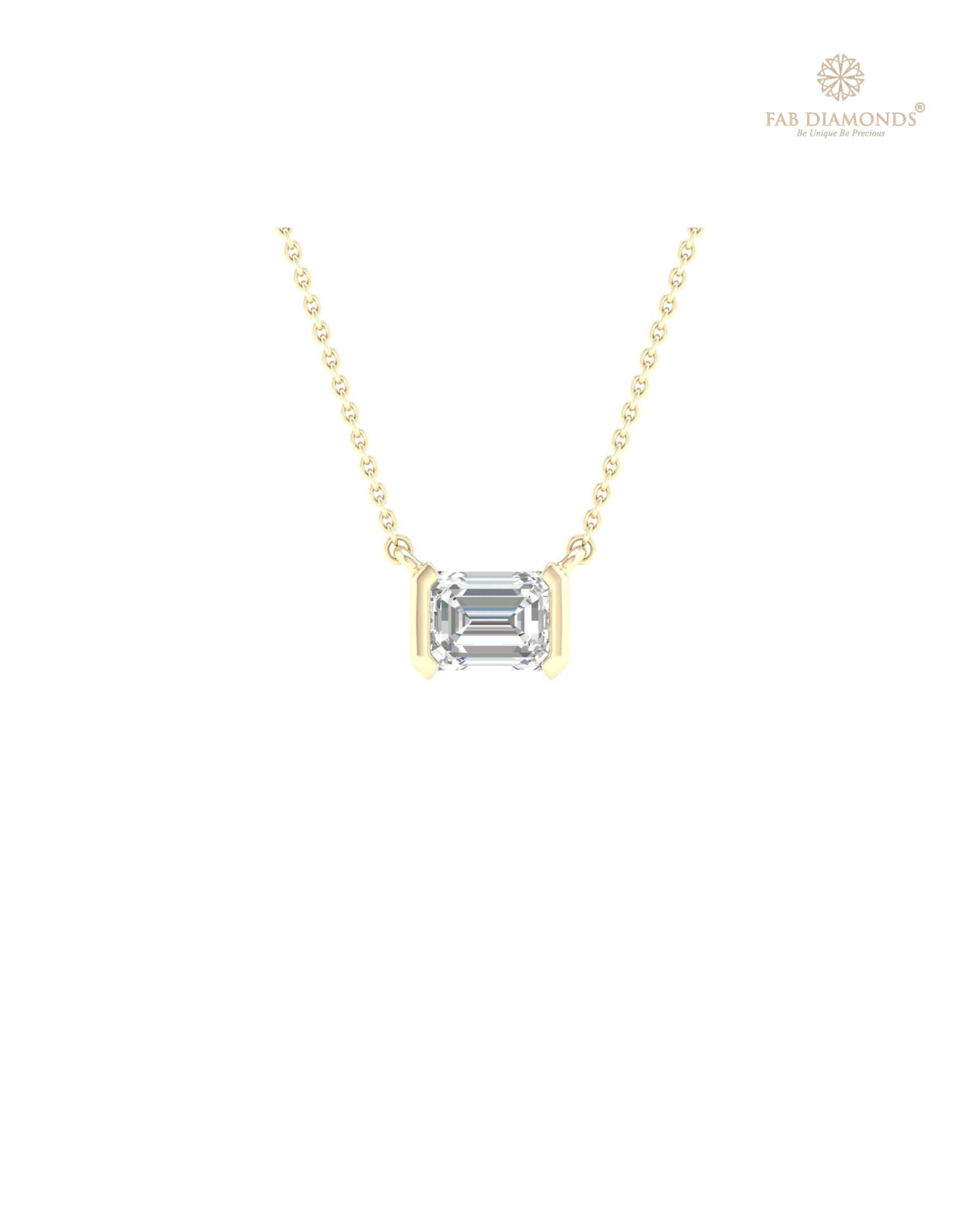 The PS05557 Floating Solitaire Diamond Pendant (0.33 Cts) on white atelier plate with FAB hallmark