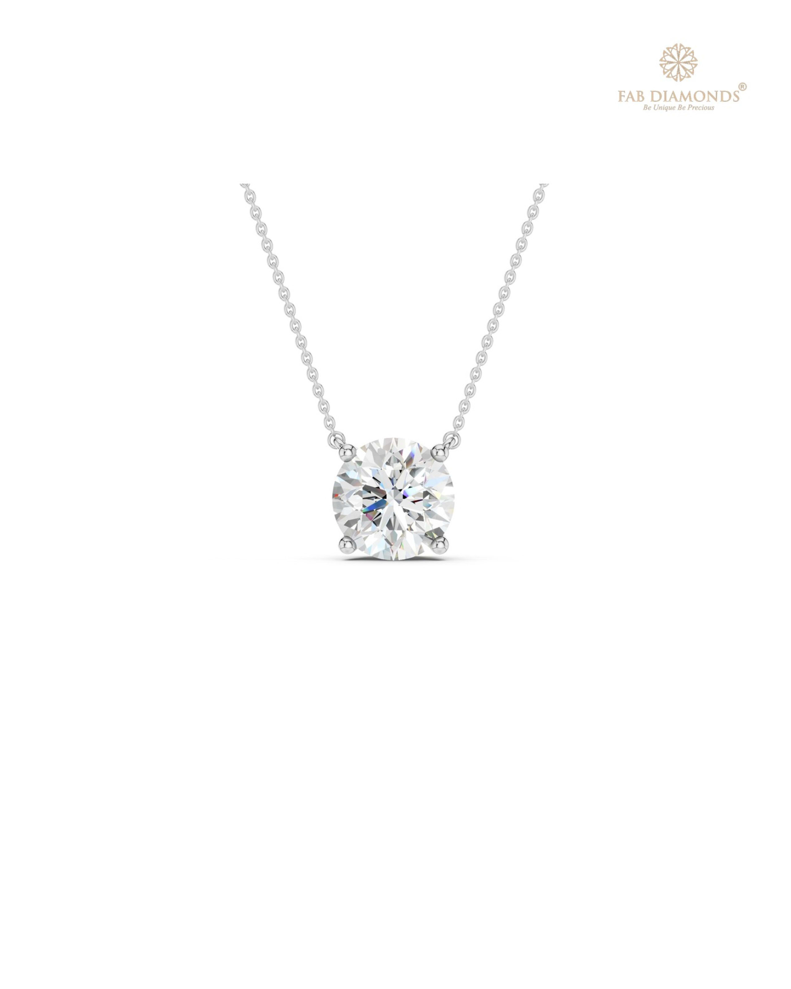 The PS06450 Classic Solitaire Diamond Pendant (1.50 Cts) on white atelier plate with FAB hallmark