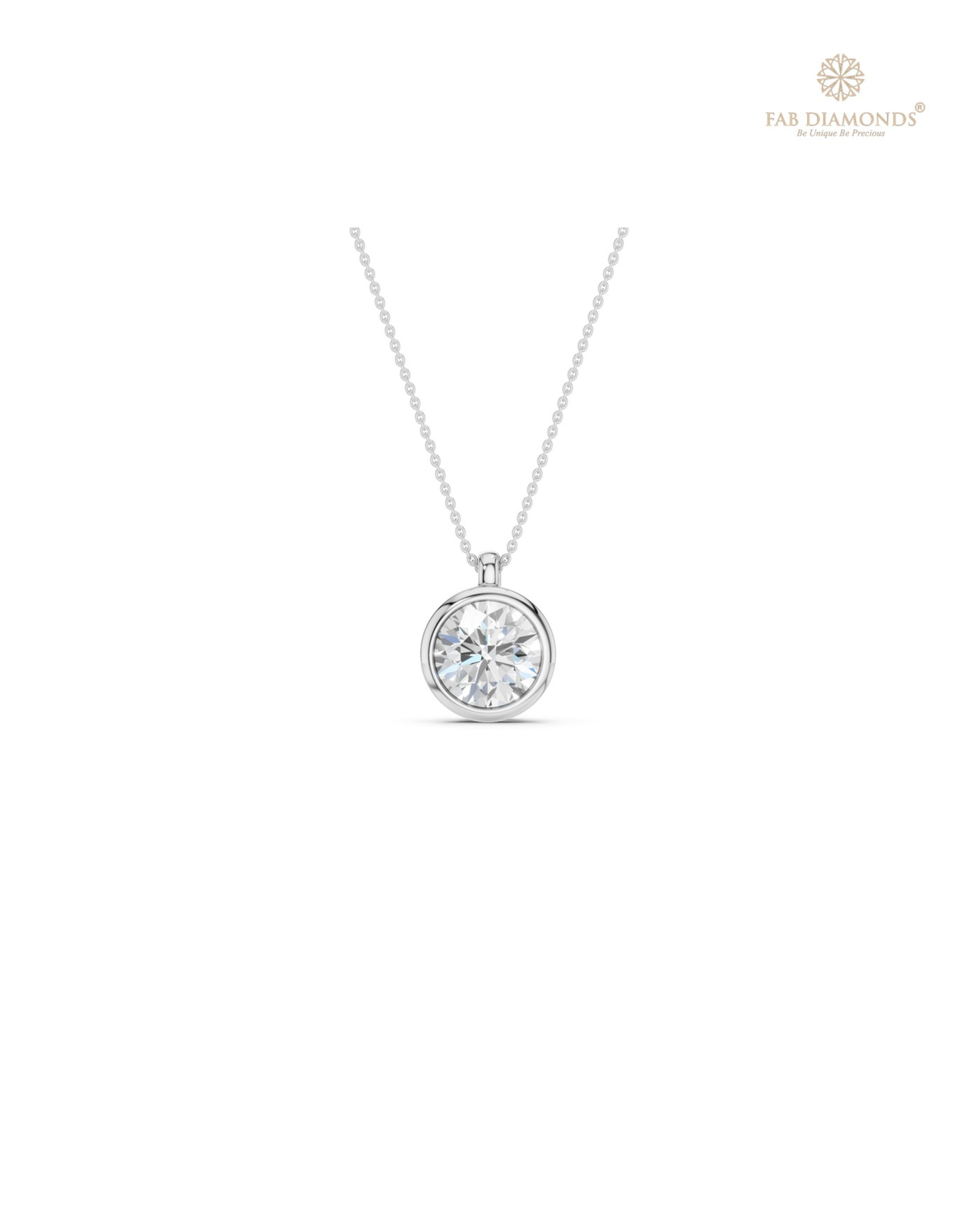 The PS06466 Classic Solitaire Diamond Pendant (1.50 Cts) on white atelier plate with FAB hallmark