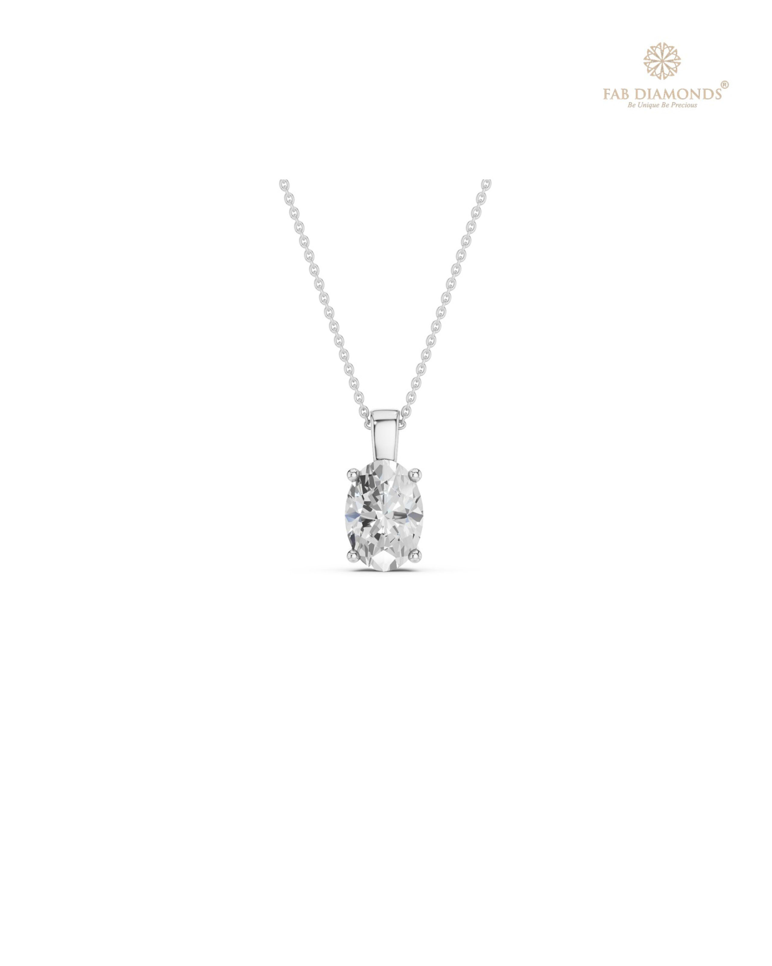 The PS06469 Floating Solitaire Diamond Pendant (0.75 Cts) on white atelier plate with FAB hallmark