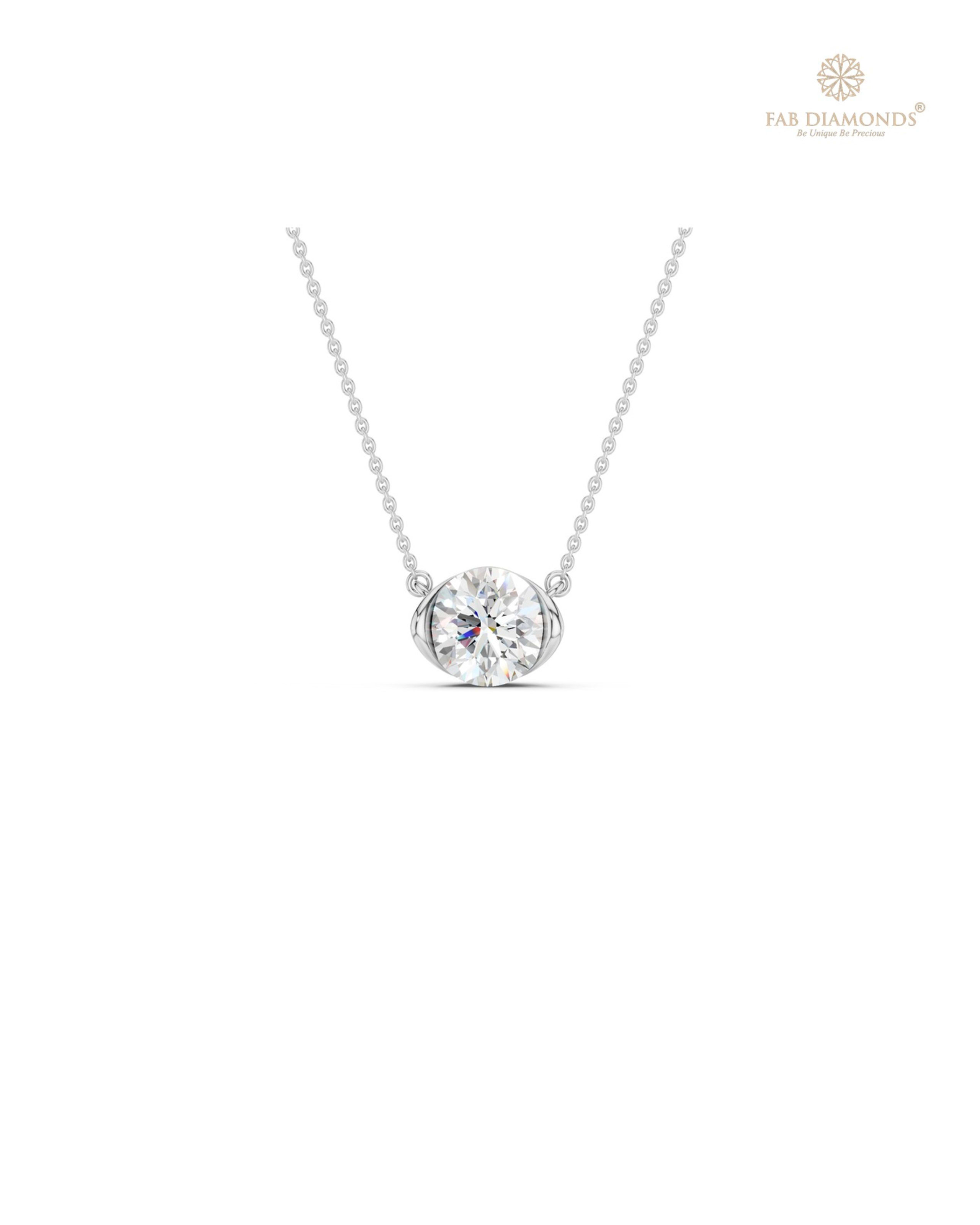 The PS06477 Architectural Solitaire Diamond Pendant (0.75 Cts) on white atelier plate with FAB hallmark