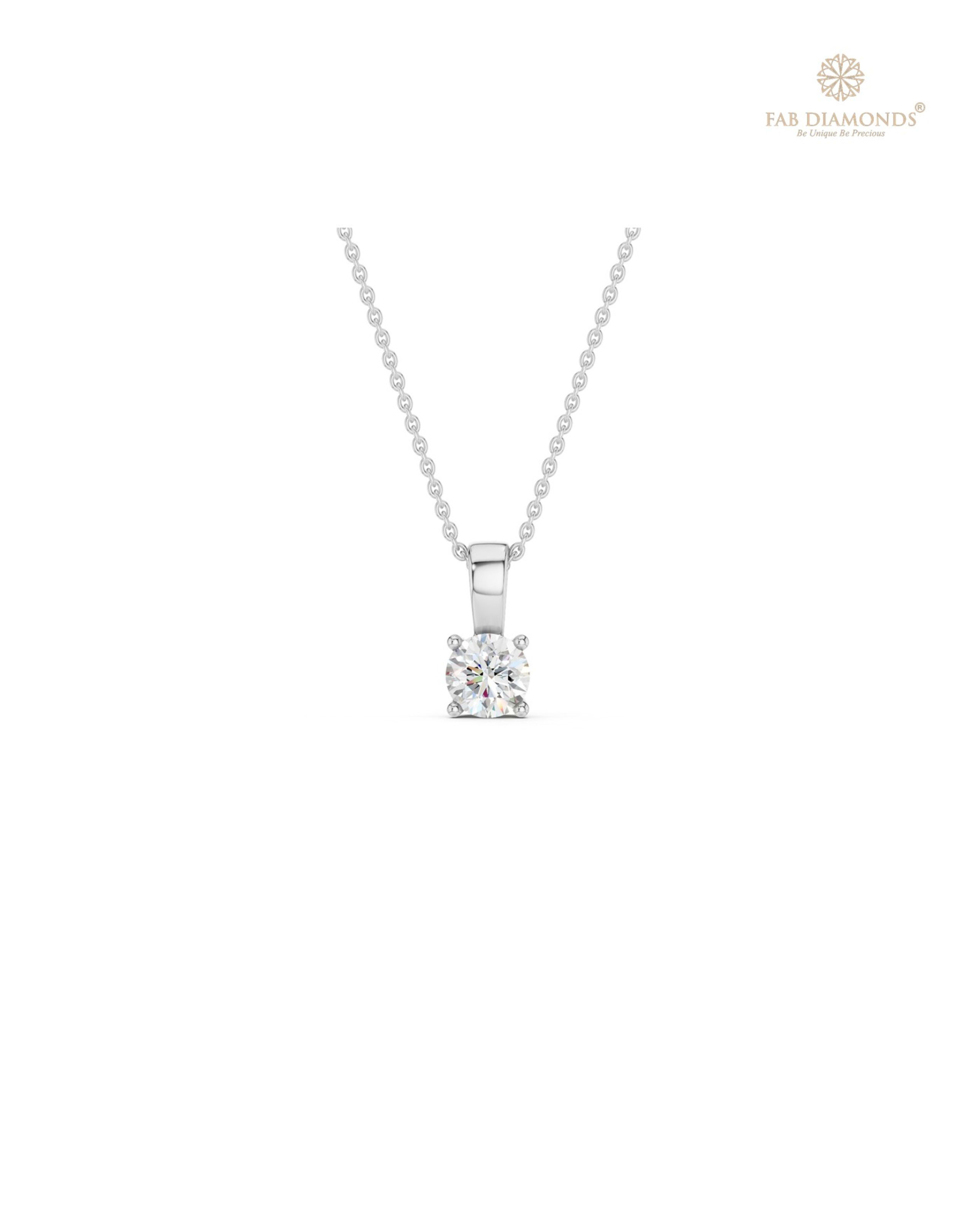 The PS06505 Floating Solitaire Diamond Pendant (0.20 Cts) on white atelier plate with FAB hallmark