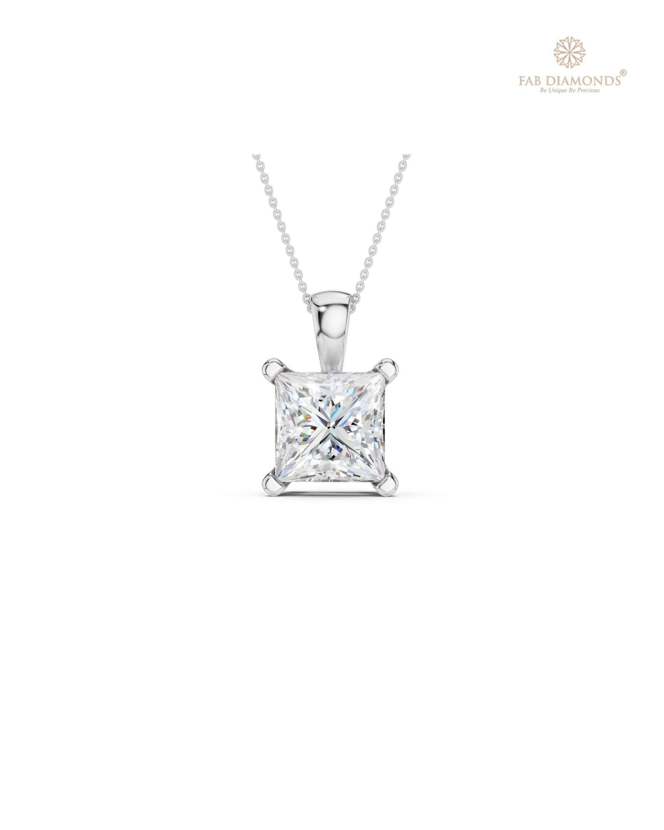 The PS06517 Grand Solitaire Diamond Pendant (4.00 Cts) on white atelier plate with FAB hallmark