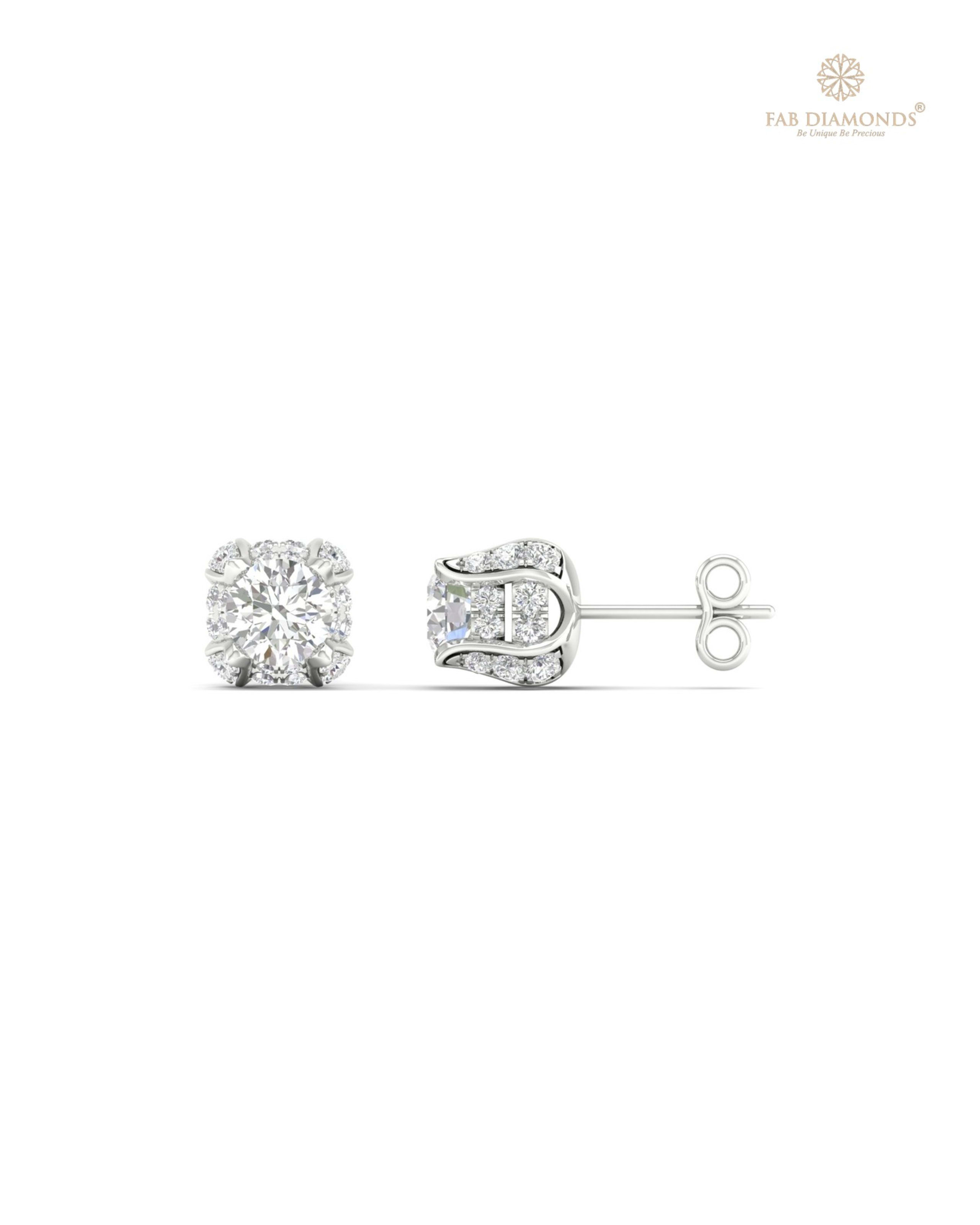 The ES00189 Diamond Halo Diamond Studs (0.99 Cts) on white atelier plate with FAB hallmark