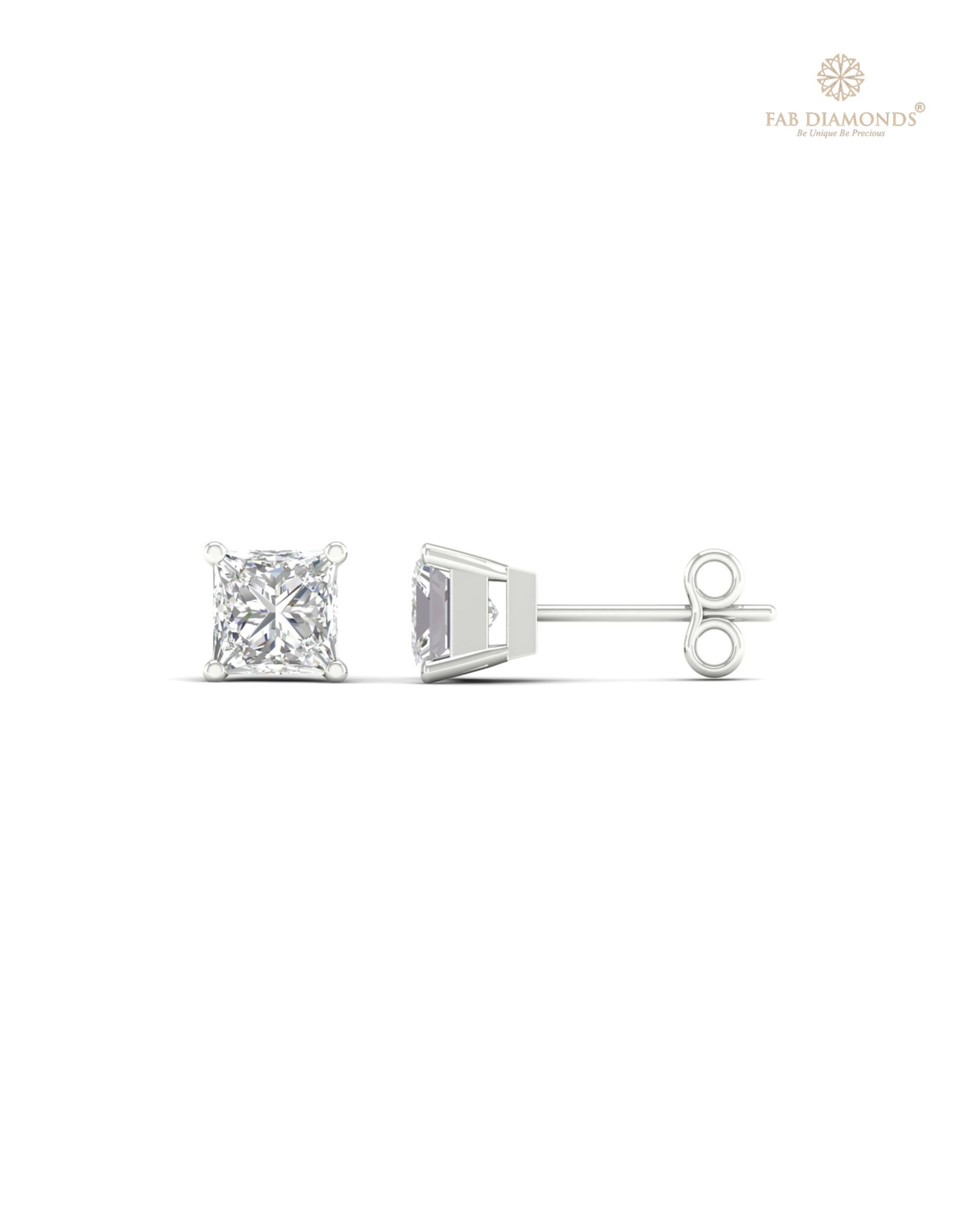 The ES00268 Classic Solitaire Diamond Studs (1.04 Cts) on white atelier plate with FAB hallmark
