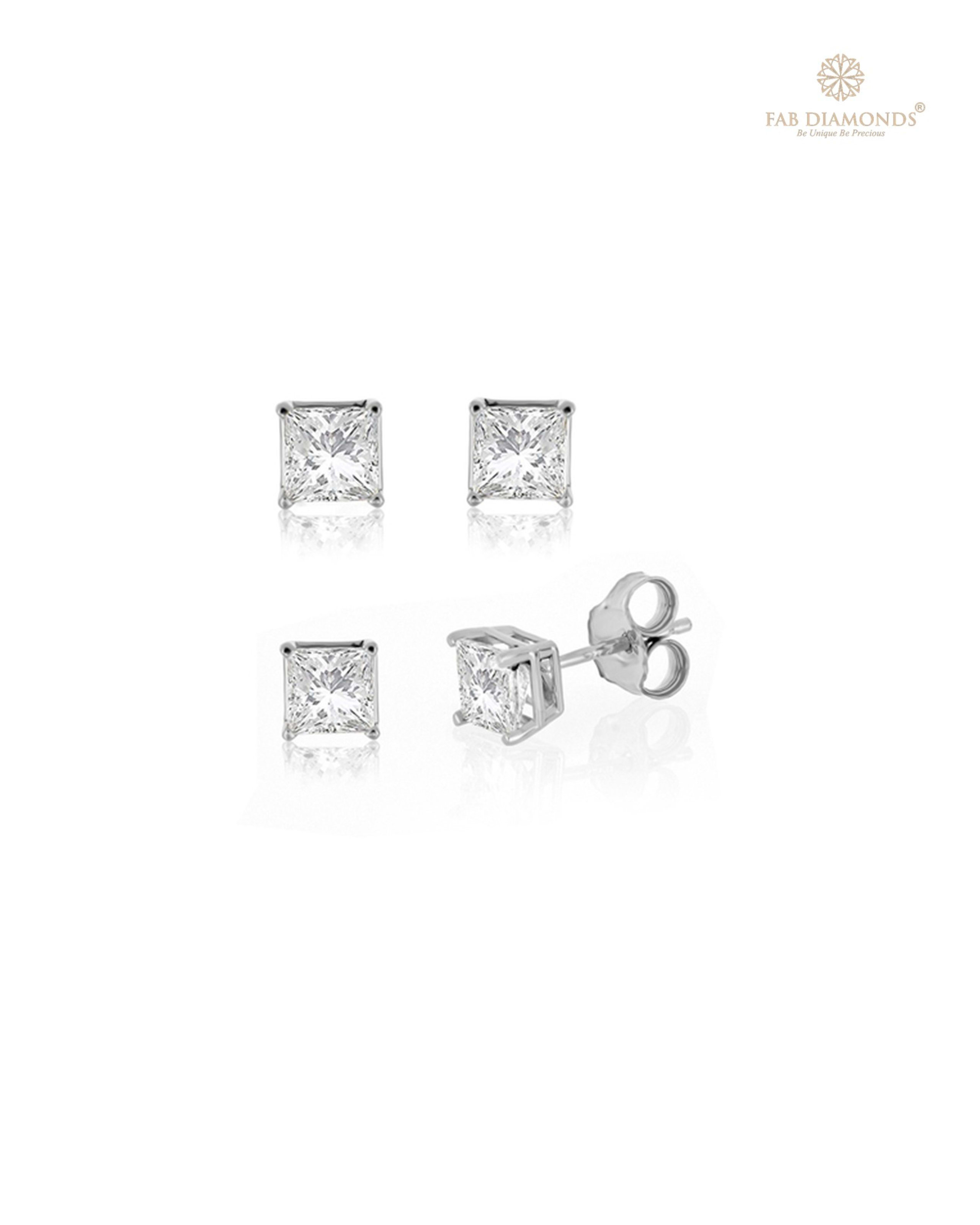 The ES00669 Classic Solitaire Diamond Studs (0.42 Cts) on white atelier plate with FAB hallmark