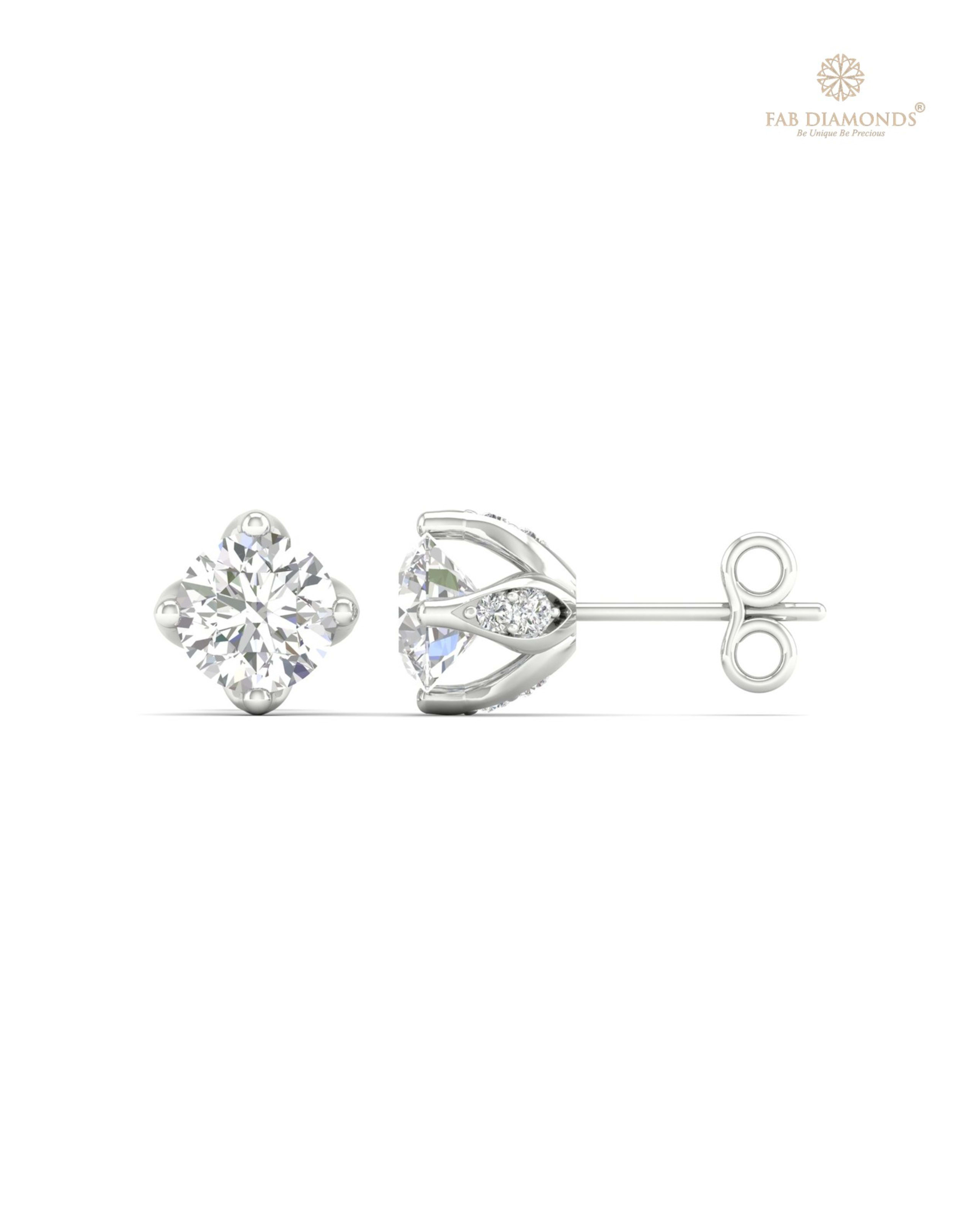 The ES00734 Diamond Halo Diamond Studs (1.99 Cts) on white atelier plate with FAB hallmark