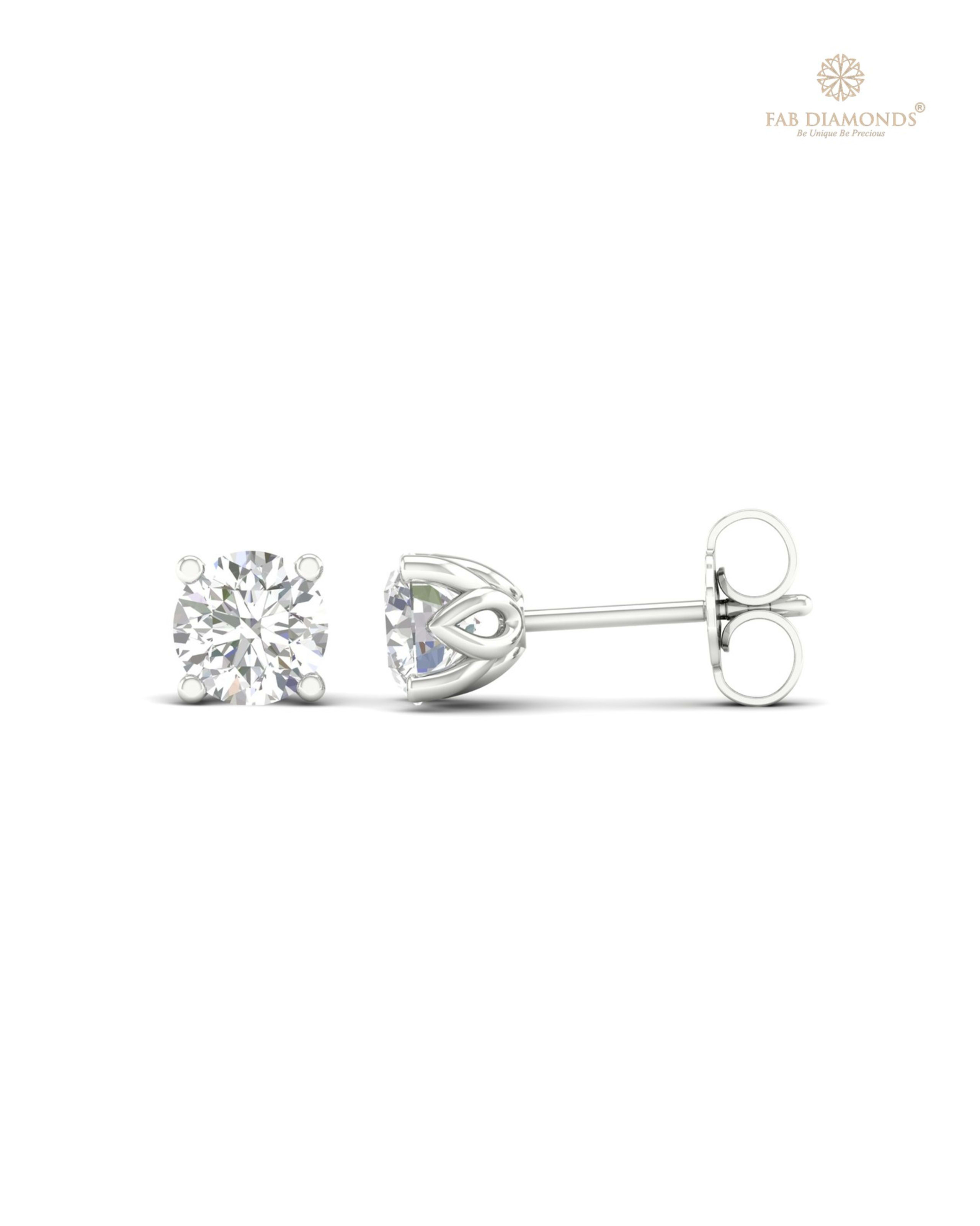 The ES00892 Classic Solitaire Diamond Studs (1.00 Cts) on white atelier plate with FAB hallmark