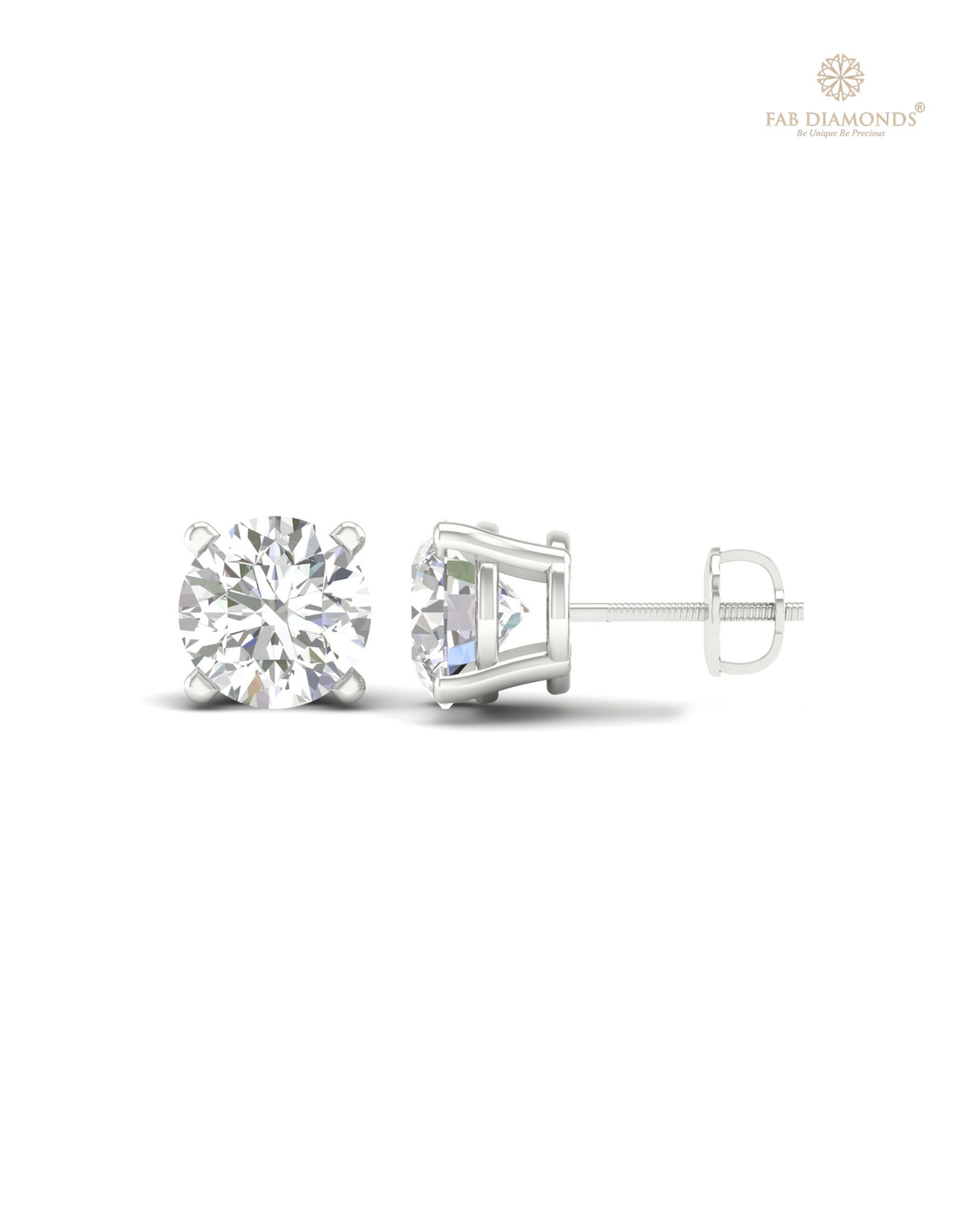 The ES01473 Classic Solitaire Diamond Studs (4.00 Cts) on white atelier plate with FAB hallmark