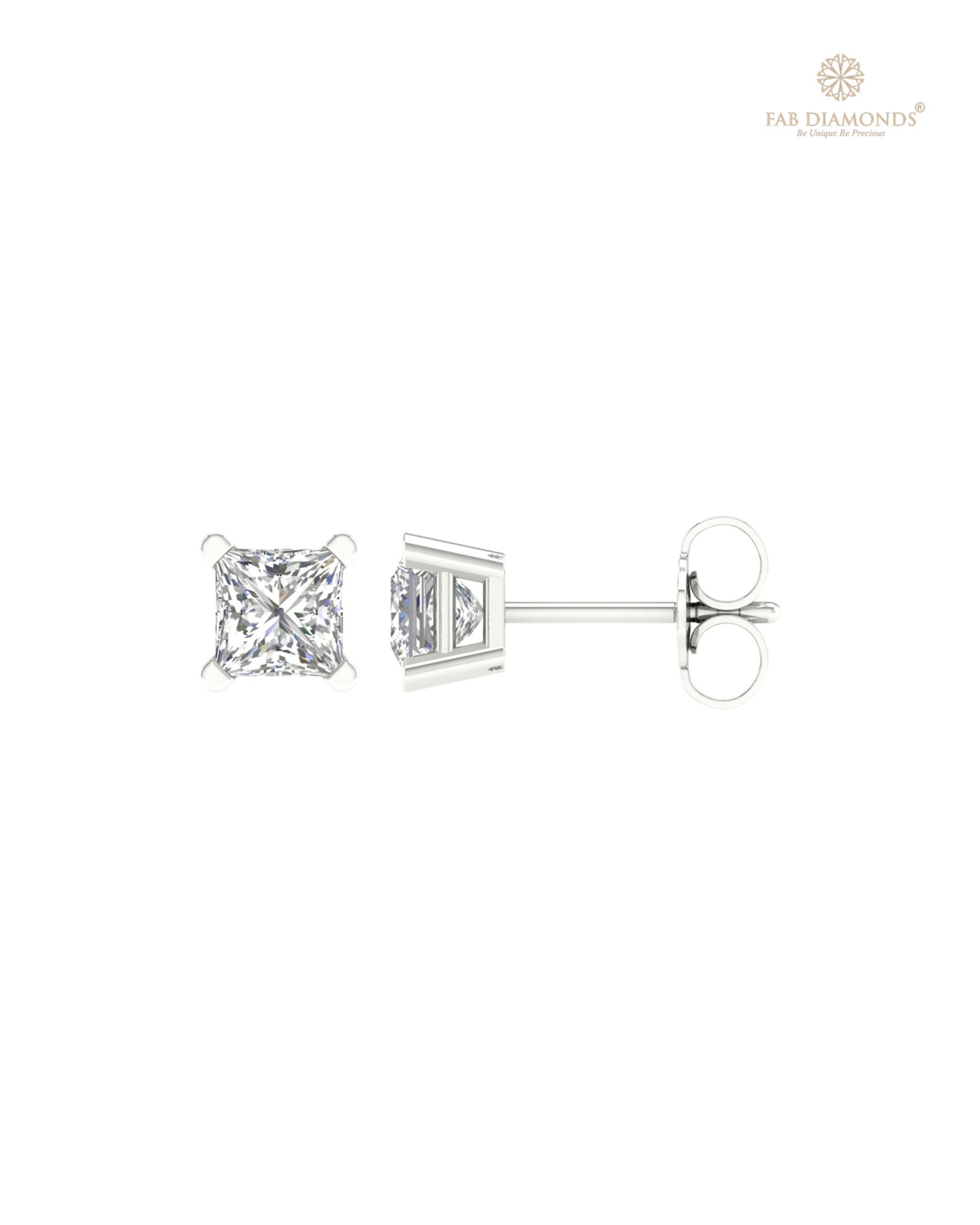 The ES01477 Classic Solitaire Diamond Studs (1.25 Cts) on white atelier plate with FAB hallmark