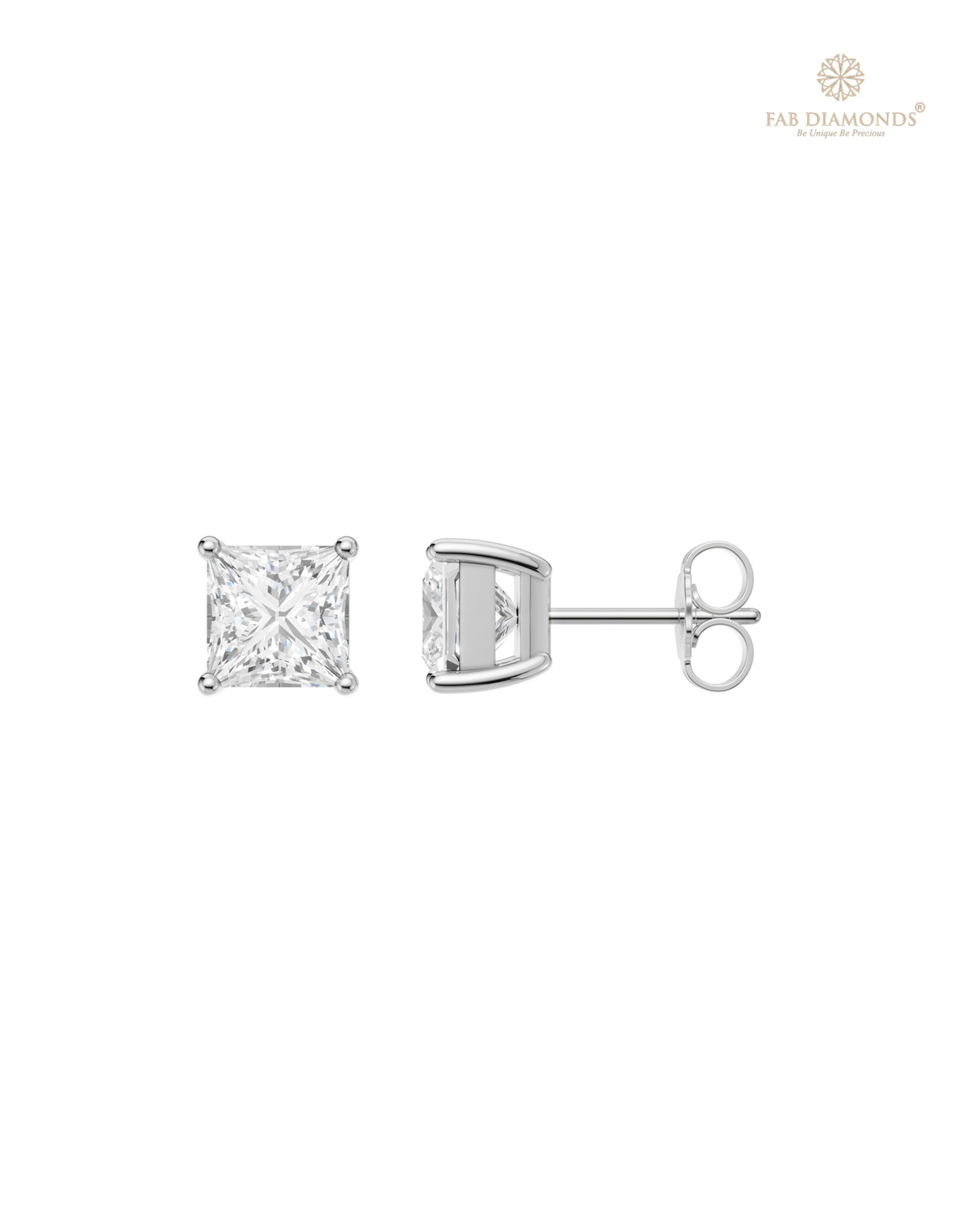 The ES01478 Classic Solitaire Diamond Studs (3.00 Cts) on white atelier plate with FAB hallmark