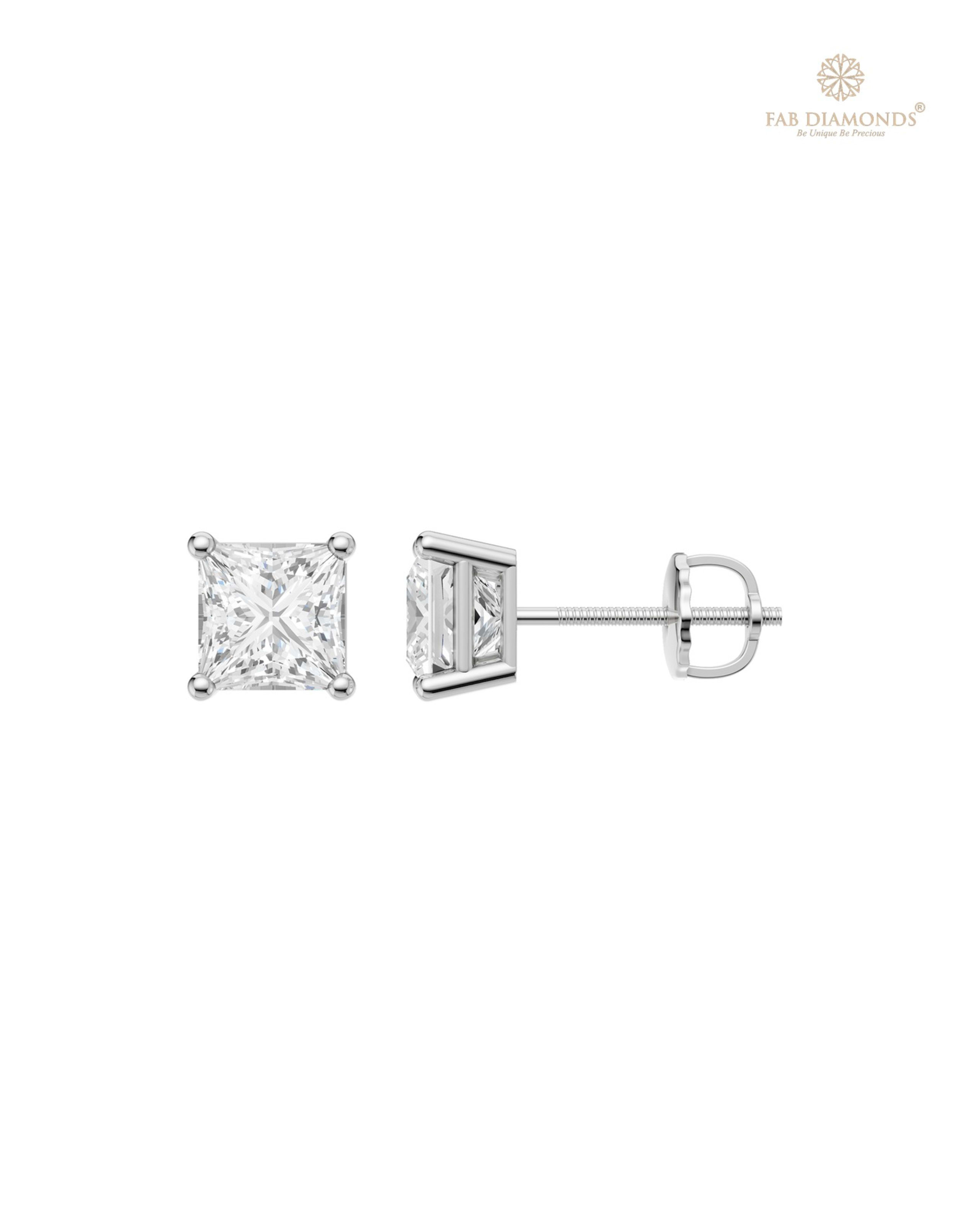 The ES01502 Classic Solitaire Diamond Studs (3.00 Cts) on white atelier plate with FAB hallmark