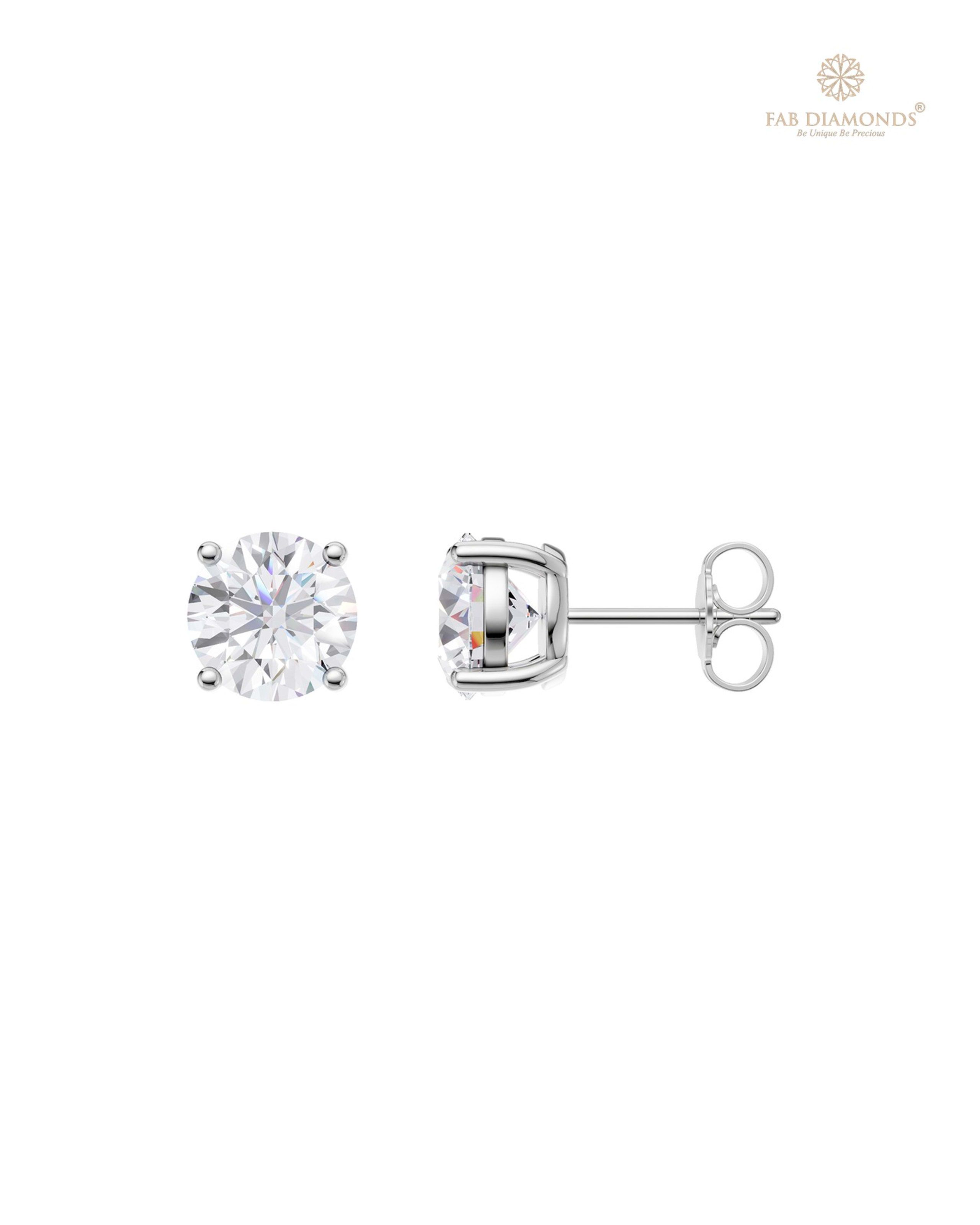 The ES01514 Classic Solitaire Diamond Studs (3.00 Cts) on white atelier plate with FAB hallmark