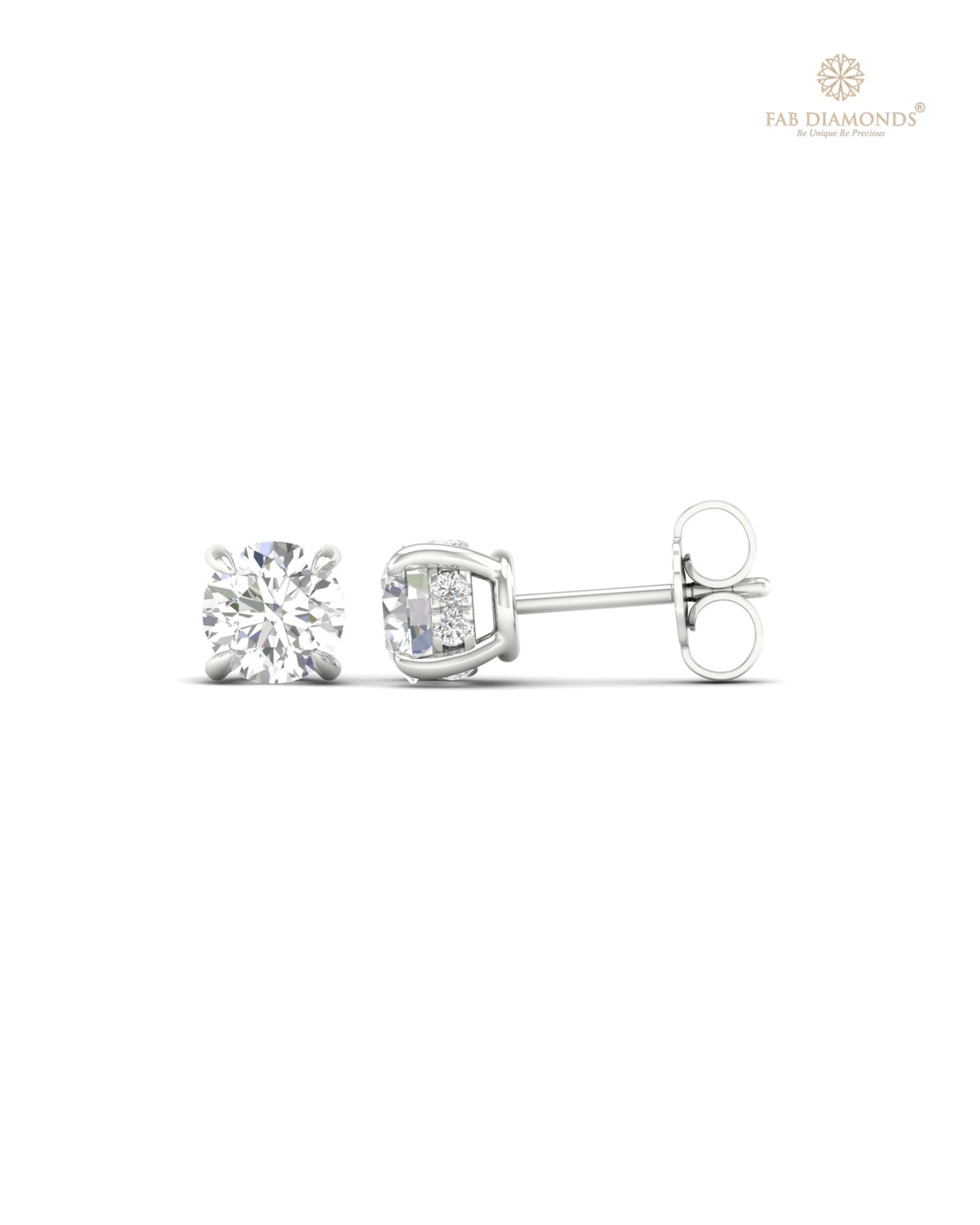 The ES10046 Diamond Halo Diamond Studs (1.11 Cts) on white atelier plate with FAB hallmark