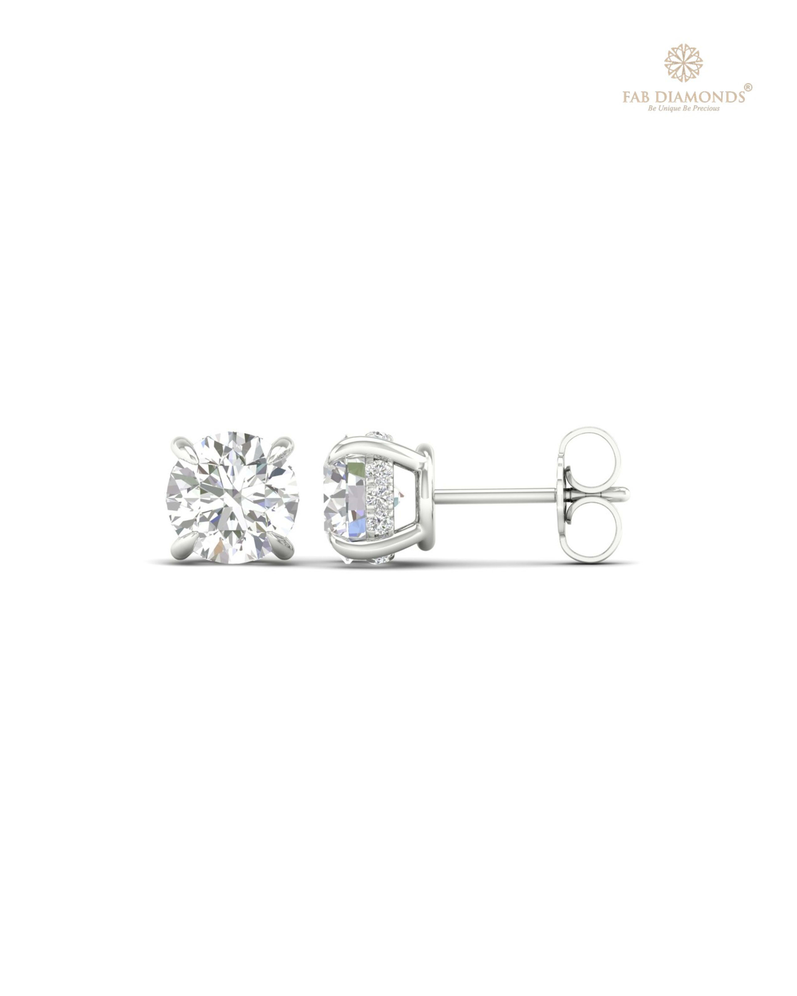 The ES10047 Diamond Halo Diamond Studs (2.12 Cts) on white atelier plate with FAB hallmark