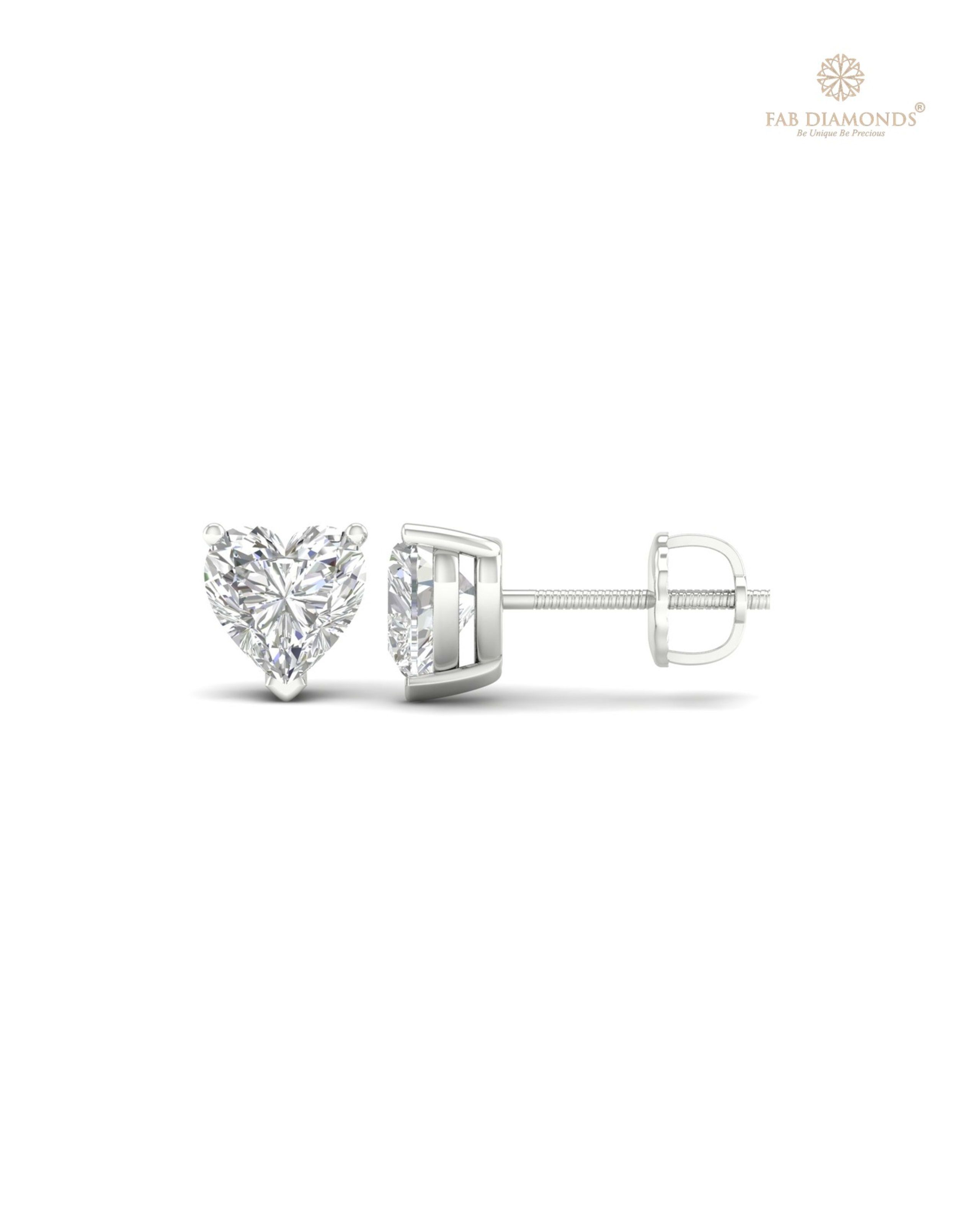 The ES10055 Classic Solitaire Diamond Studs (2.00 Cts) on white atelier plate with FAB hallmark