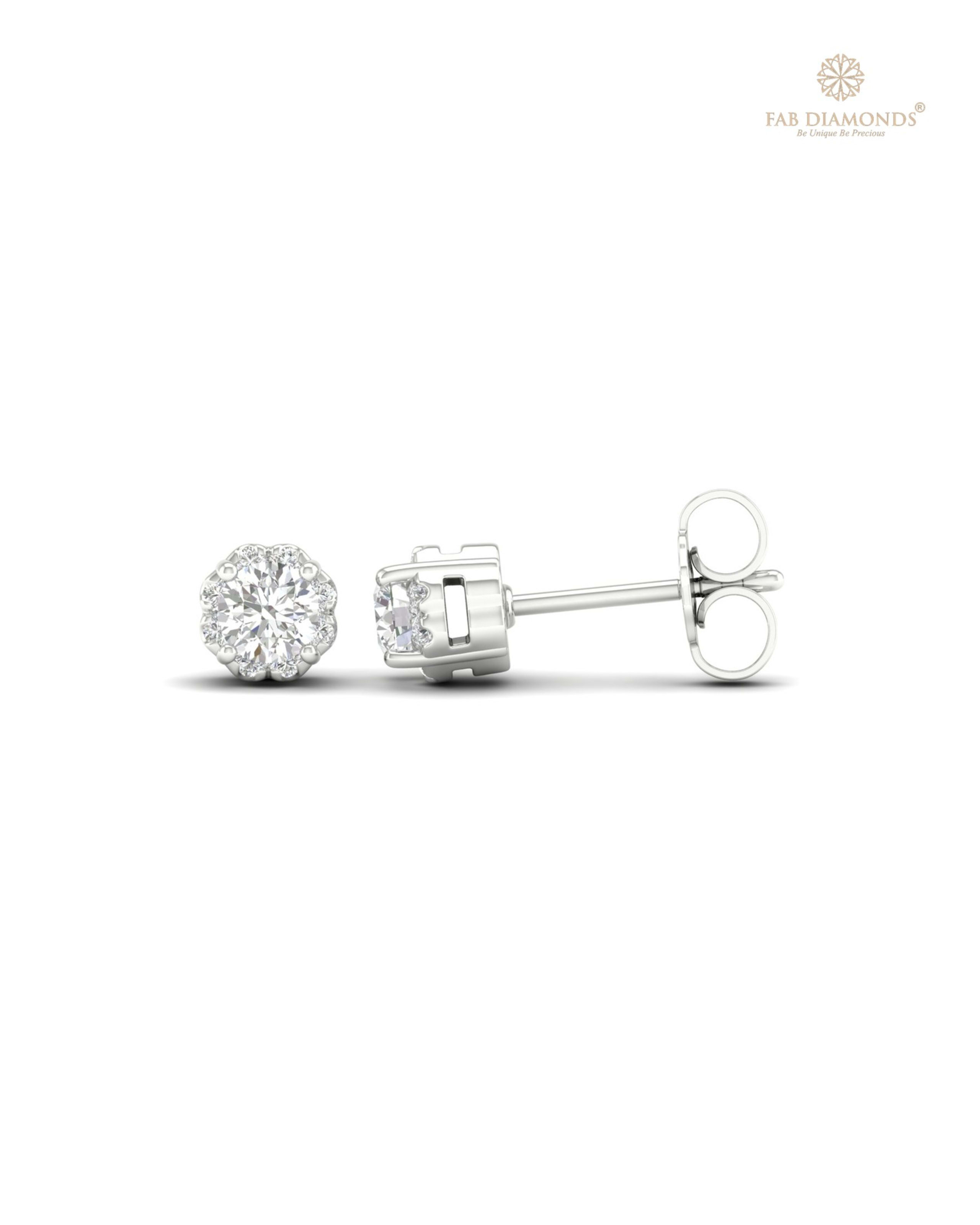 The ES10063 Diamond Halo Diamond Studs (0.50 Cts) on white atelier plate with FAB hallmark