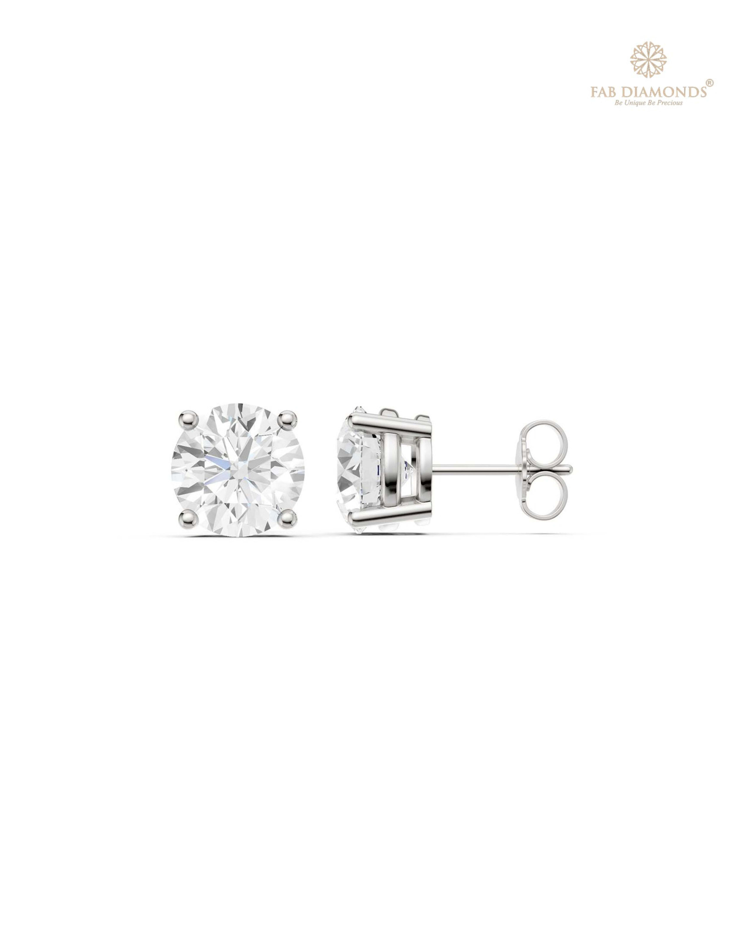 The ES10102 Classic Solitaire Diamond Studs (5.00 Cts) on white atelier plate with FAB hallmark