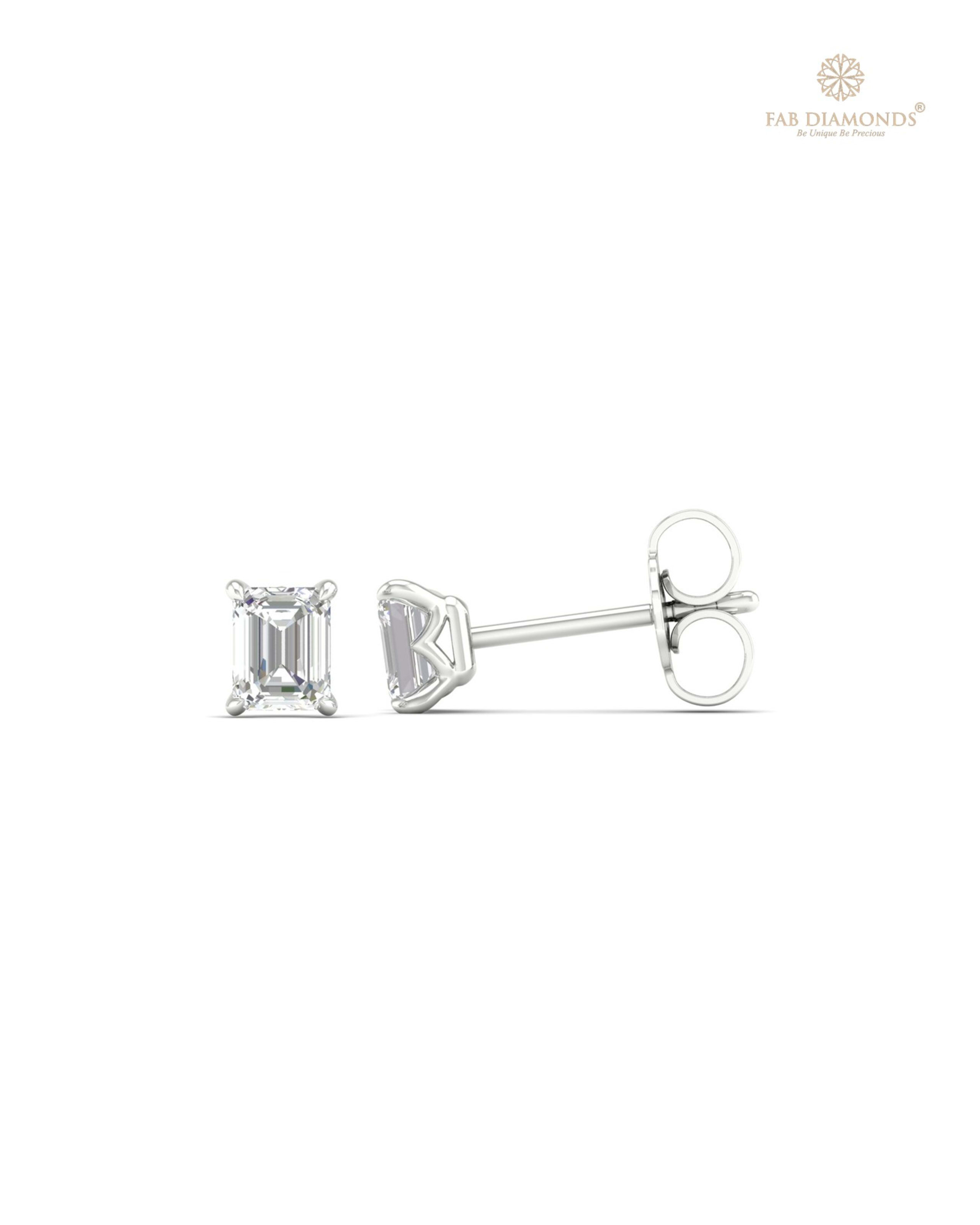The ES10118 Classic Solitaire Diamond Studs (0.66 Cts) on white atelier plate with FAB hallmark
