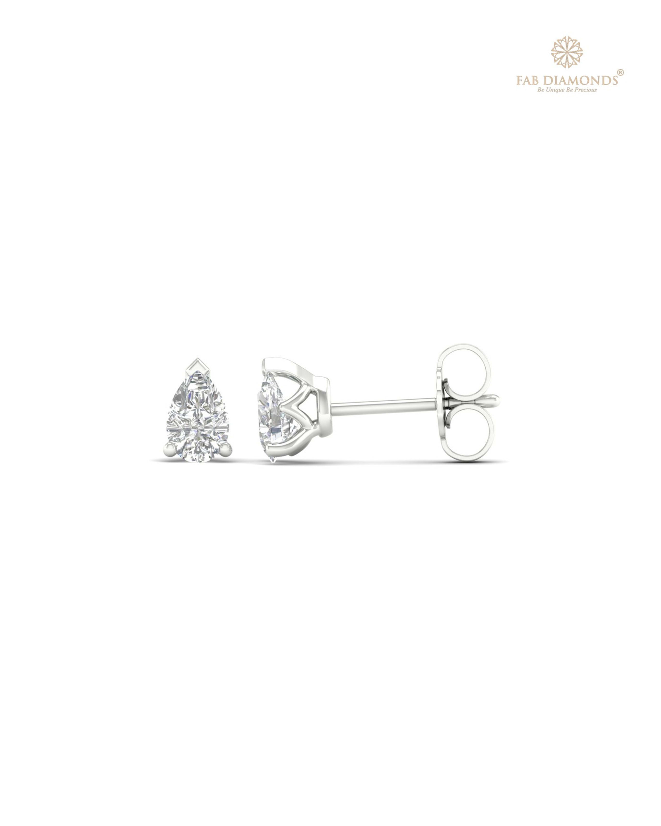 The ES10122 Classic Solitaire Diamond Studs (0.42 Cts) on white atelier plate with FAB hallmark