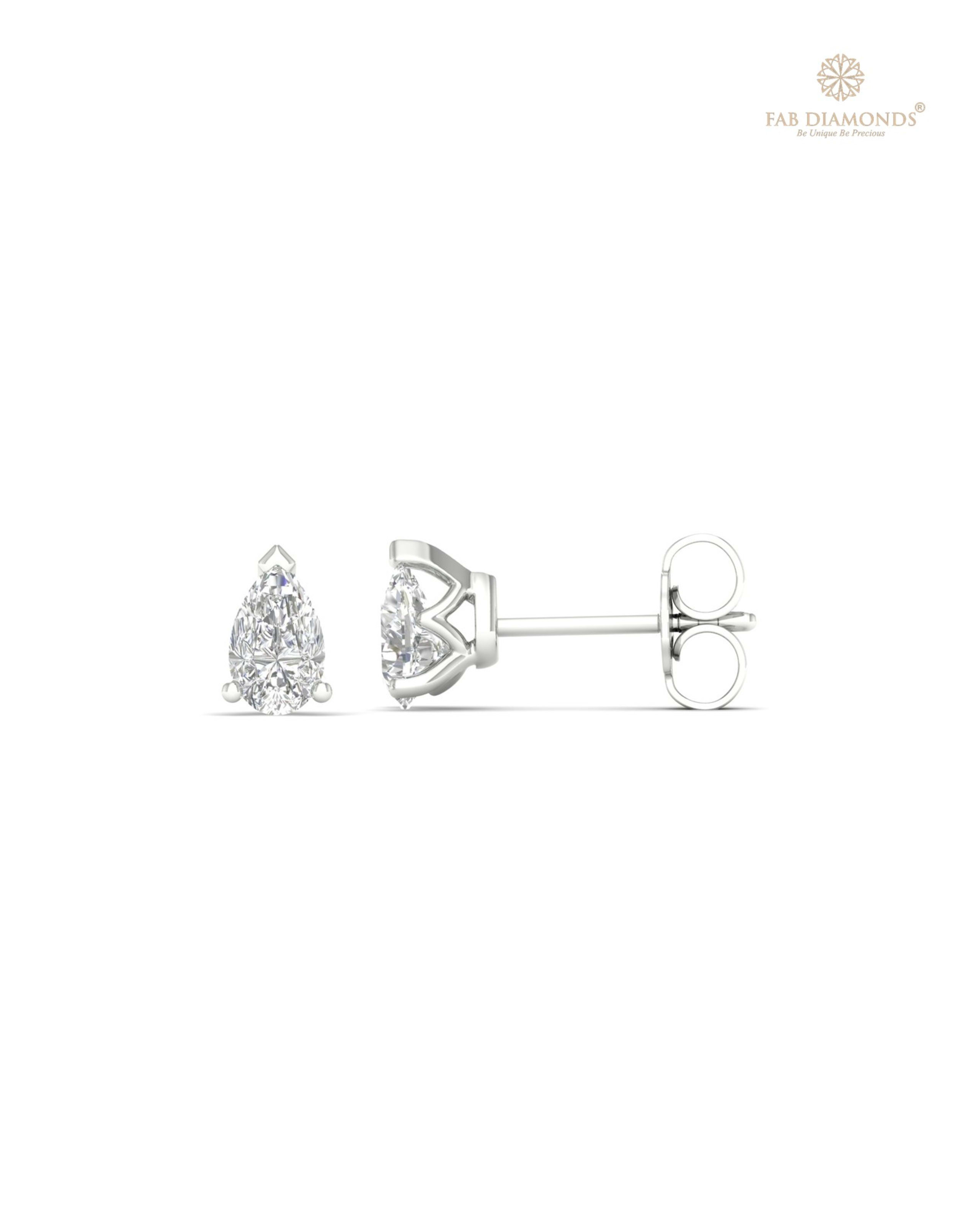 The ES10123 Classic Solitaire Diamond Studs (0.70 Cts) on white atelier plate with FAB hallmark