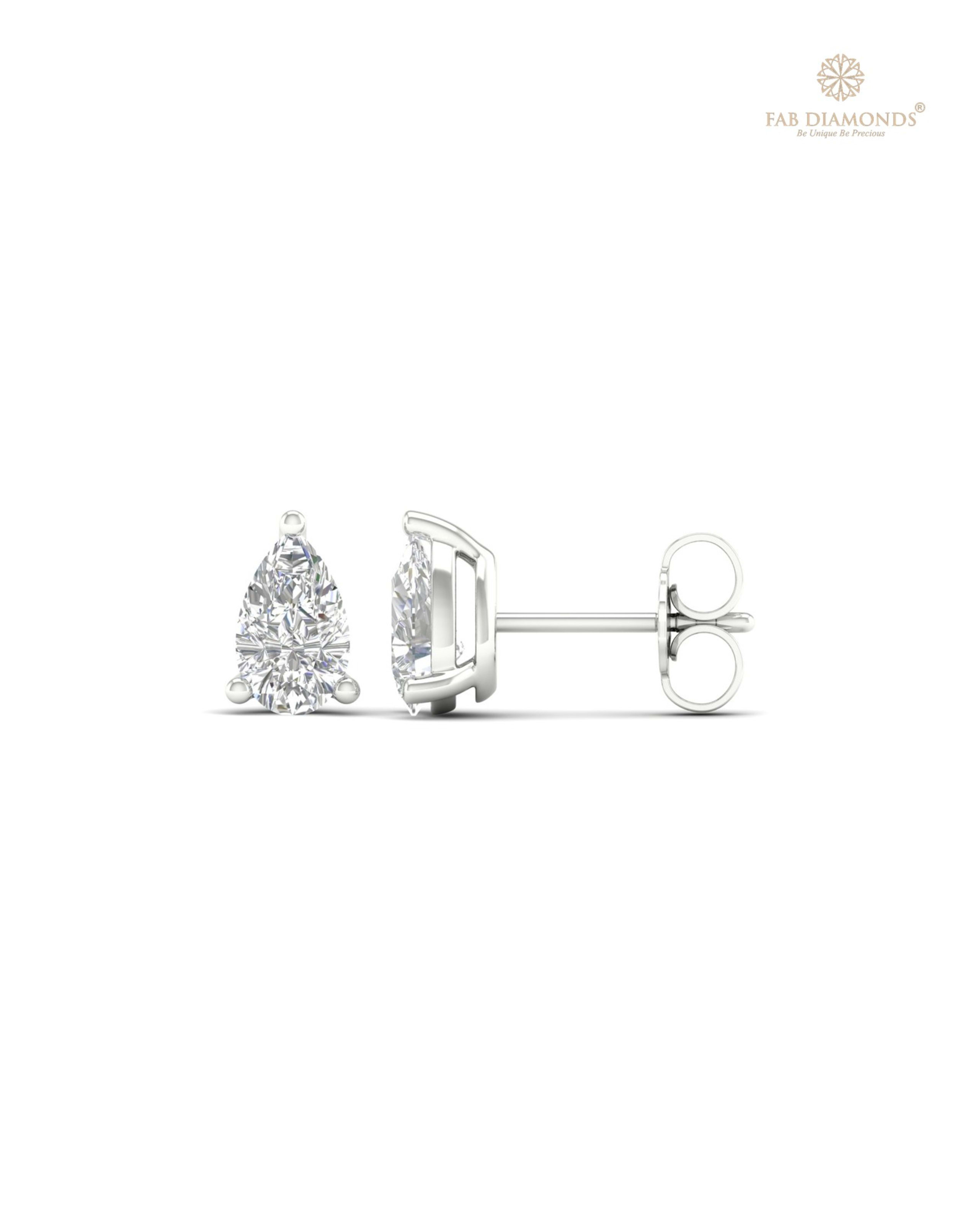 The ES10154 Classic Solitaire Diamond Studs (0.80 Cts) on white atelier plate with FAB hallmark