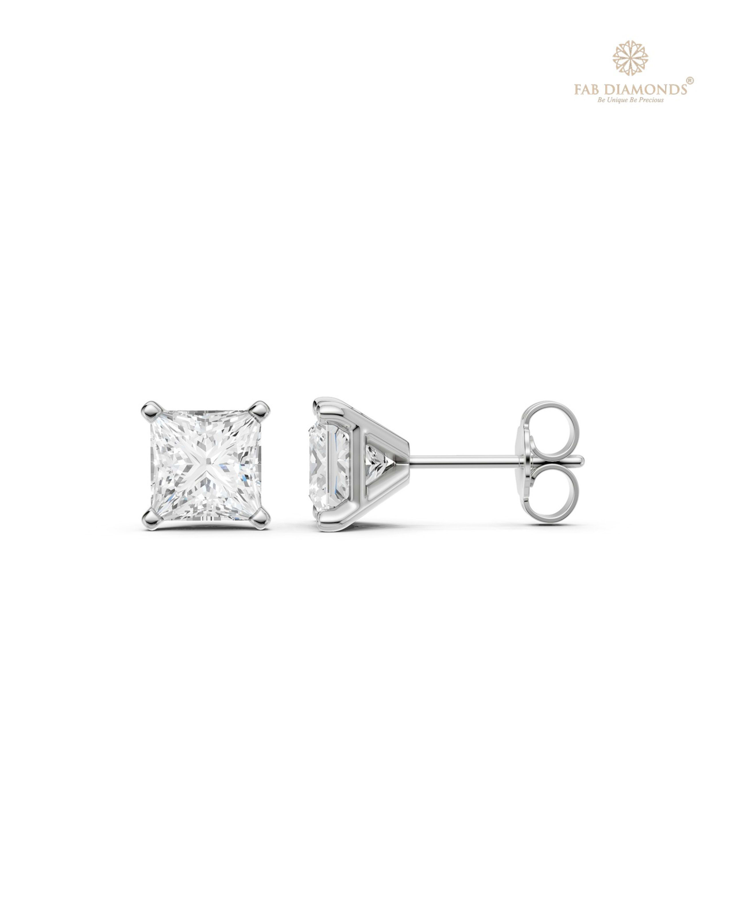 The ES10187 Classic Solitaire Diamond Studs (2.50 Cts) on white atelier plate with FAB hallmark