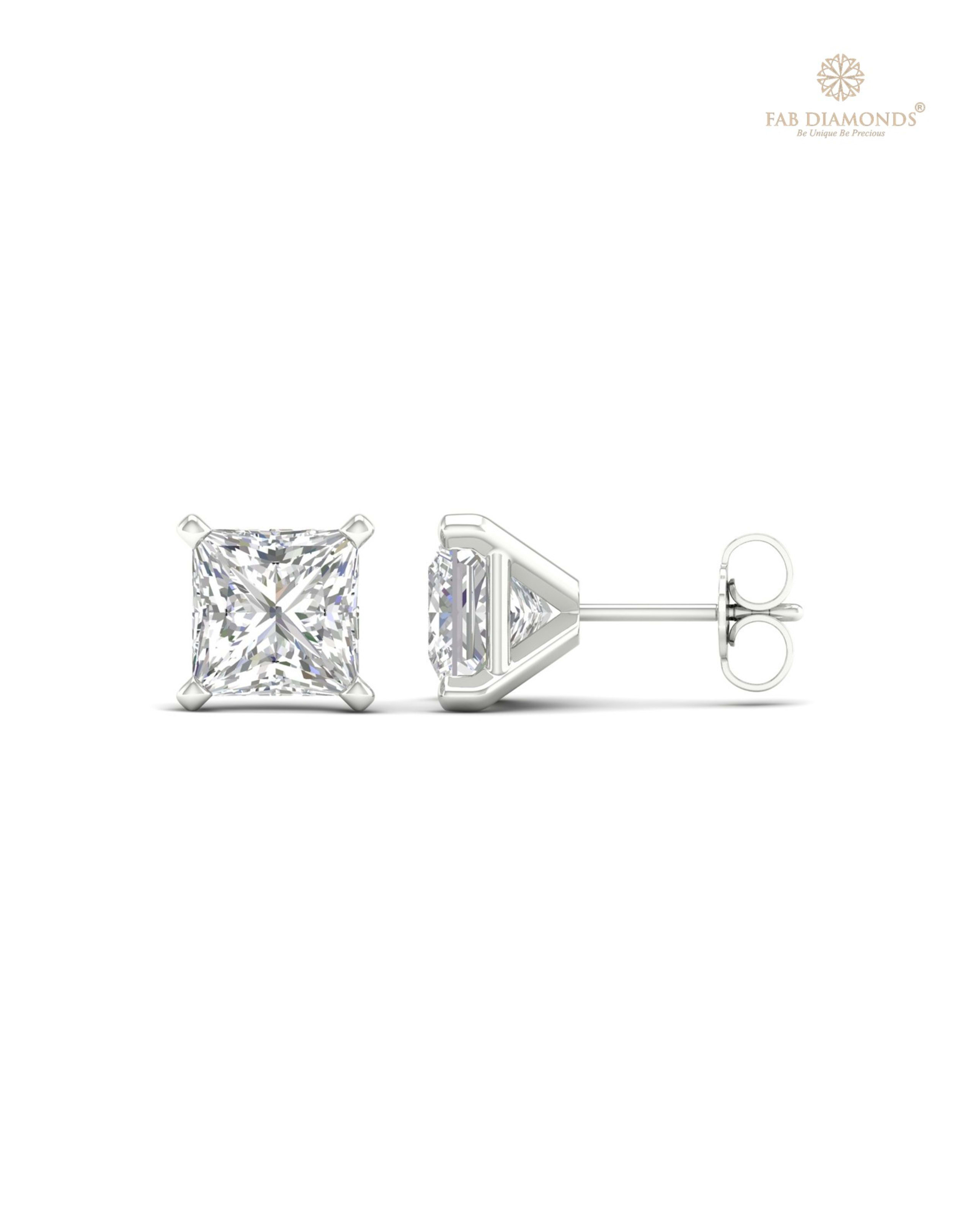 The ES10189 Classic Solitaire Diamond Studs (4.00 Cts) on white atelier plate with FAB hallmark