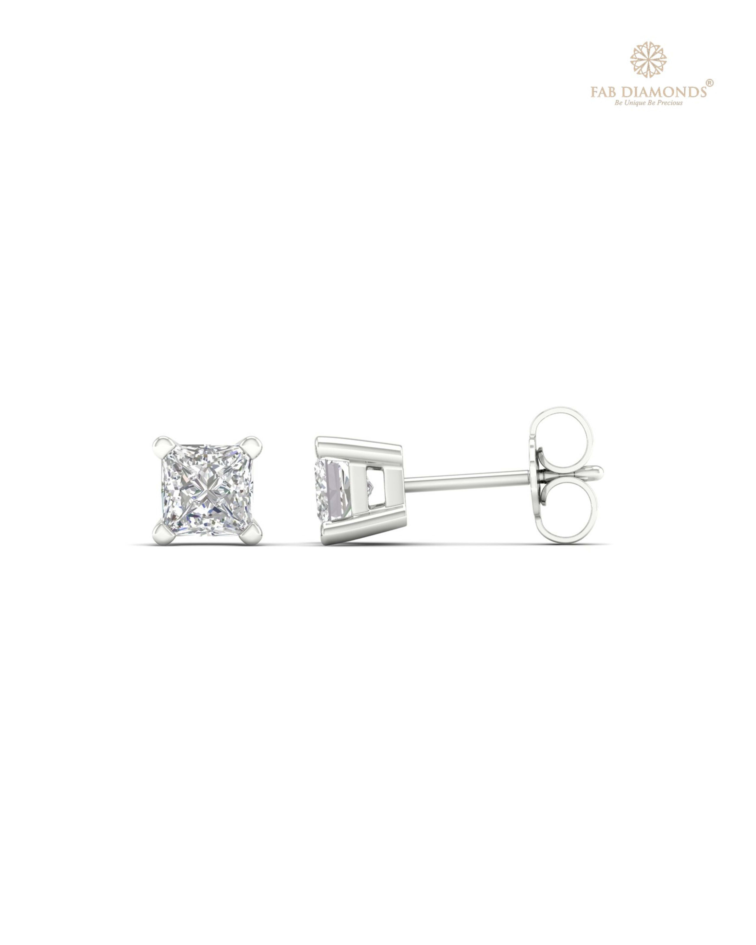 The ES10223 Classic Solitaire Diamond Studs (1.50 Cts) on white atelier plate with FAB hallmark