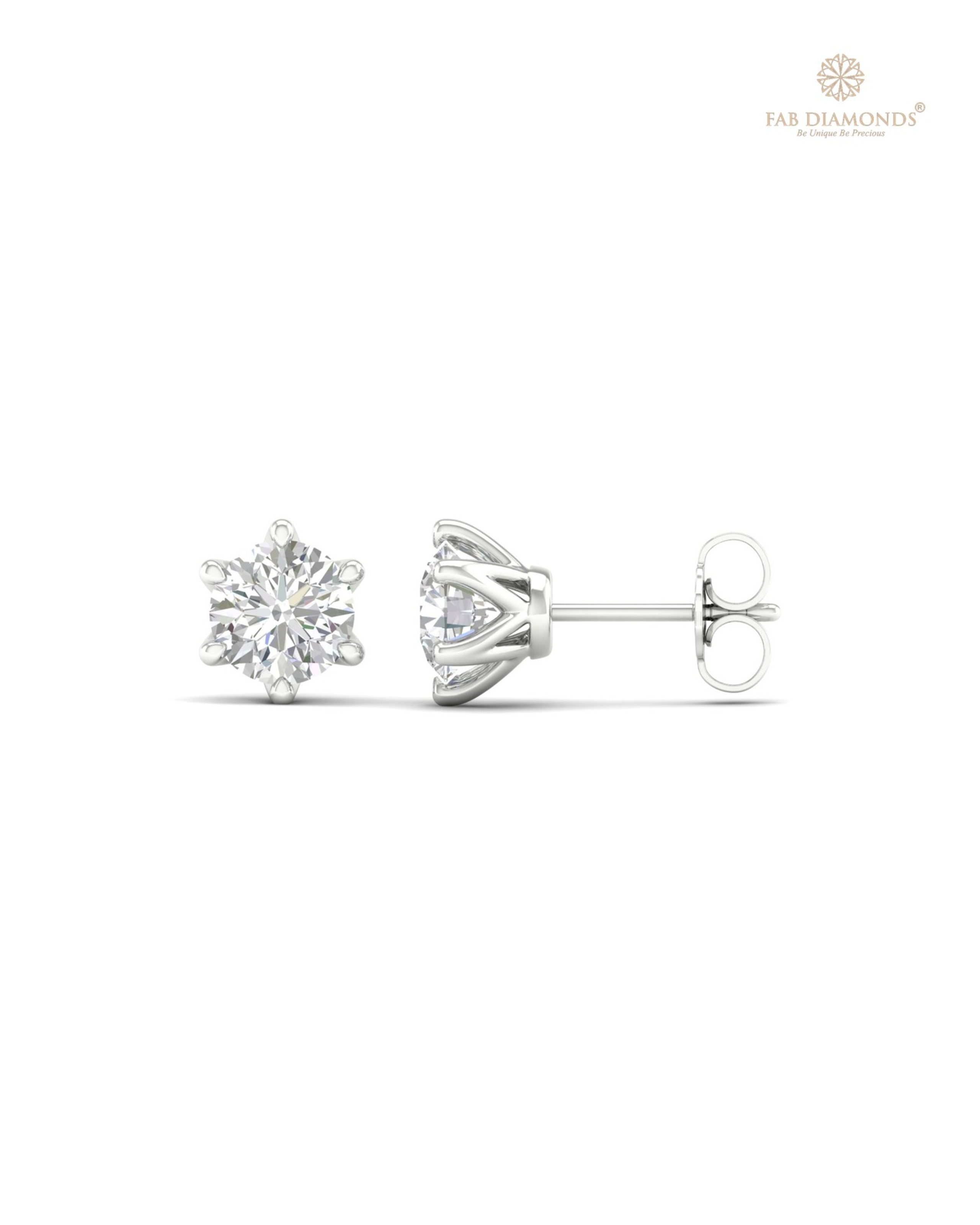 The ES10234 Classic Solitaire Diamond Studs (1.50 Cts) on white atelier plate with FAB hallmark