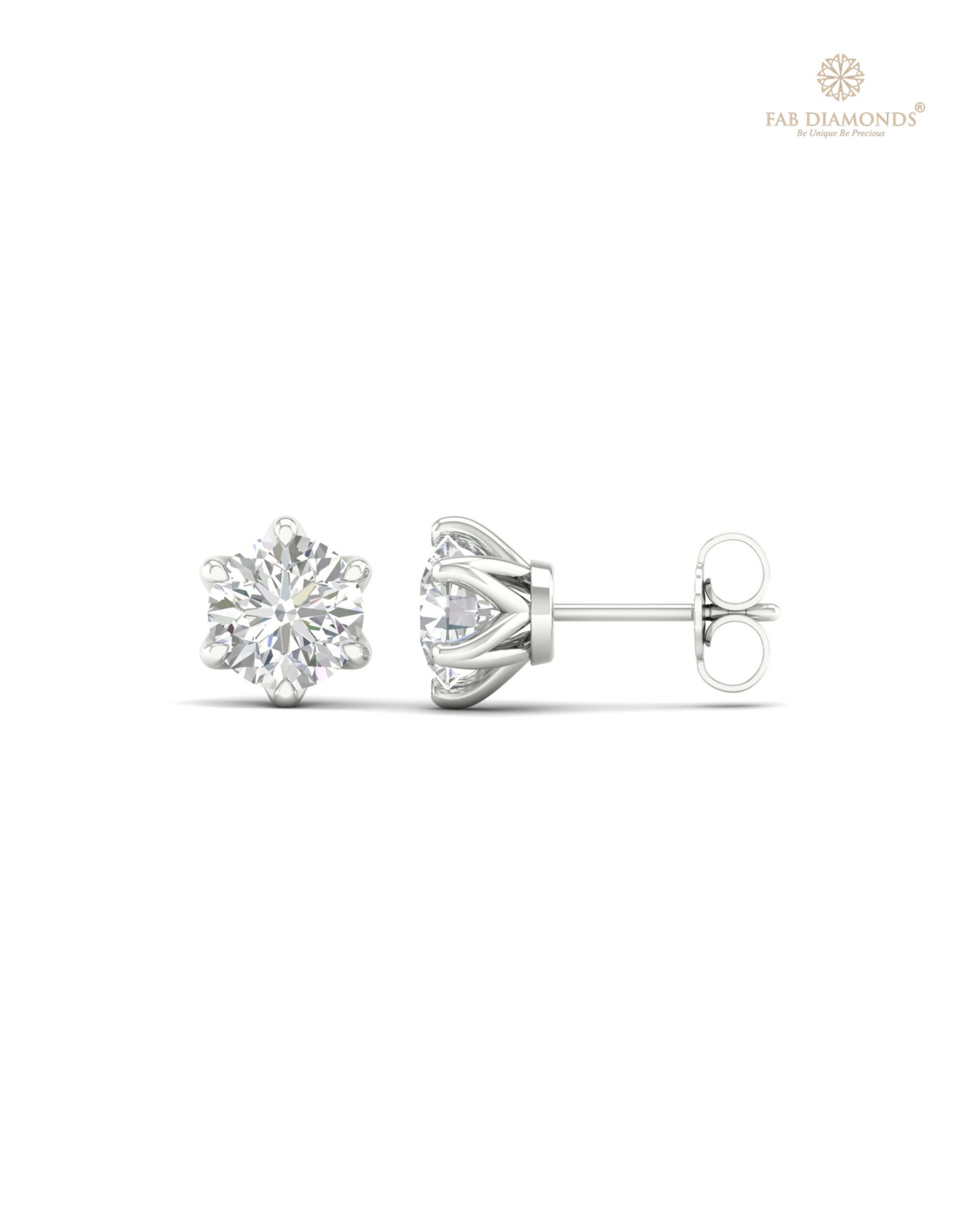 The ES10245 Classic Solitaire Diamond Studs (2.00 Cts) on white atelier plate with FAB hallmark