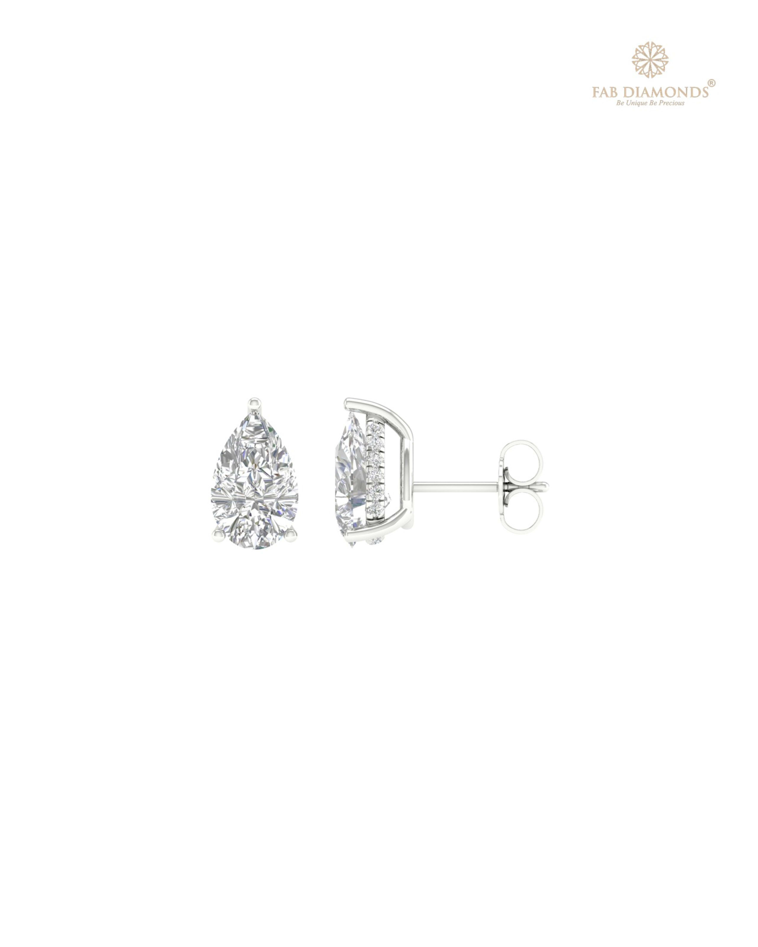 The ES10259 Diamond Halo Diamond Studs (3.18 Cts) on white atelier plate with FAB hallmark