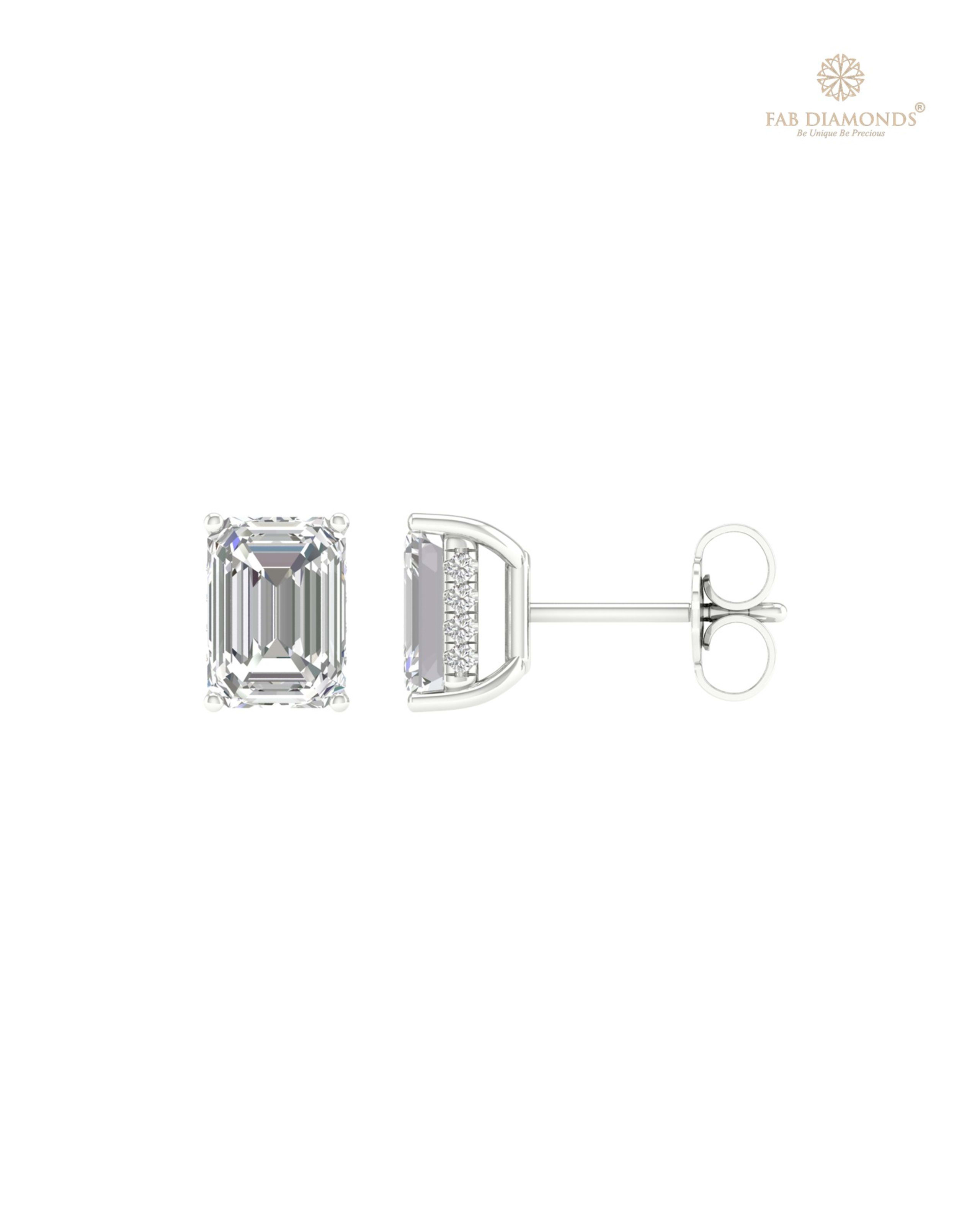 The ES10260 Diamond Halo Diamond Studs (3.17 Cts) on white atelier plate with FAB hallmark