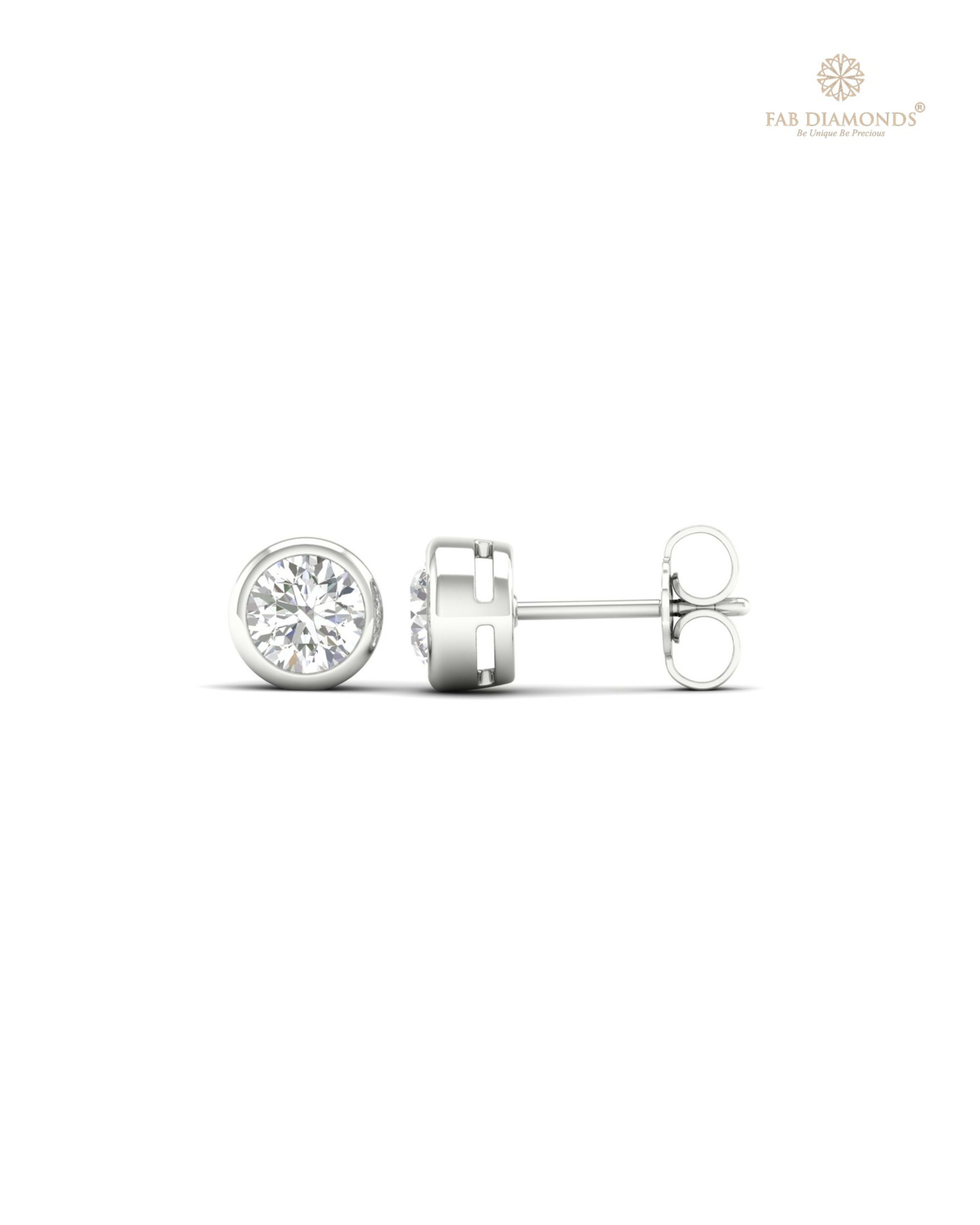 The ES10288 Classic Solitaire Diamond Studs (0.80 Cts) on white atelier plate with FAB hallmark