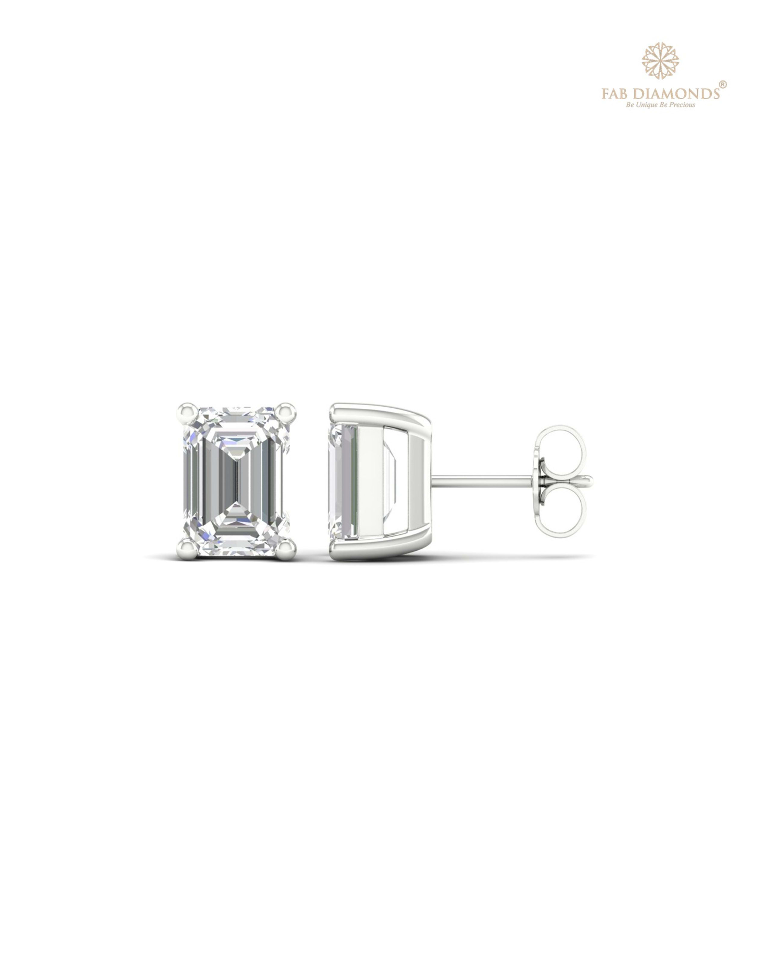 The ES10325 Classic Solitaire Diamond Studs (4.00 Cts) on white atelier plate with FAB hallmark