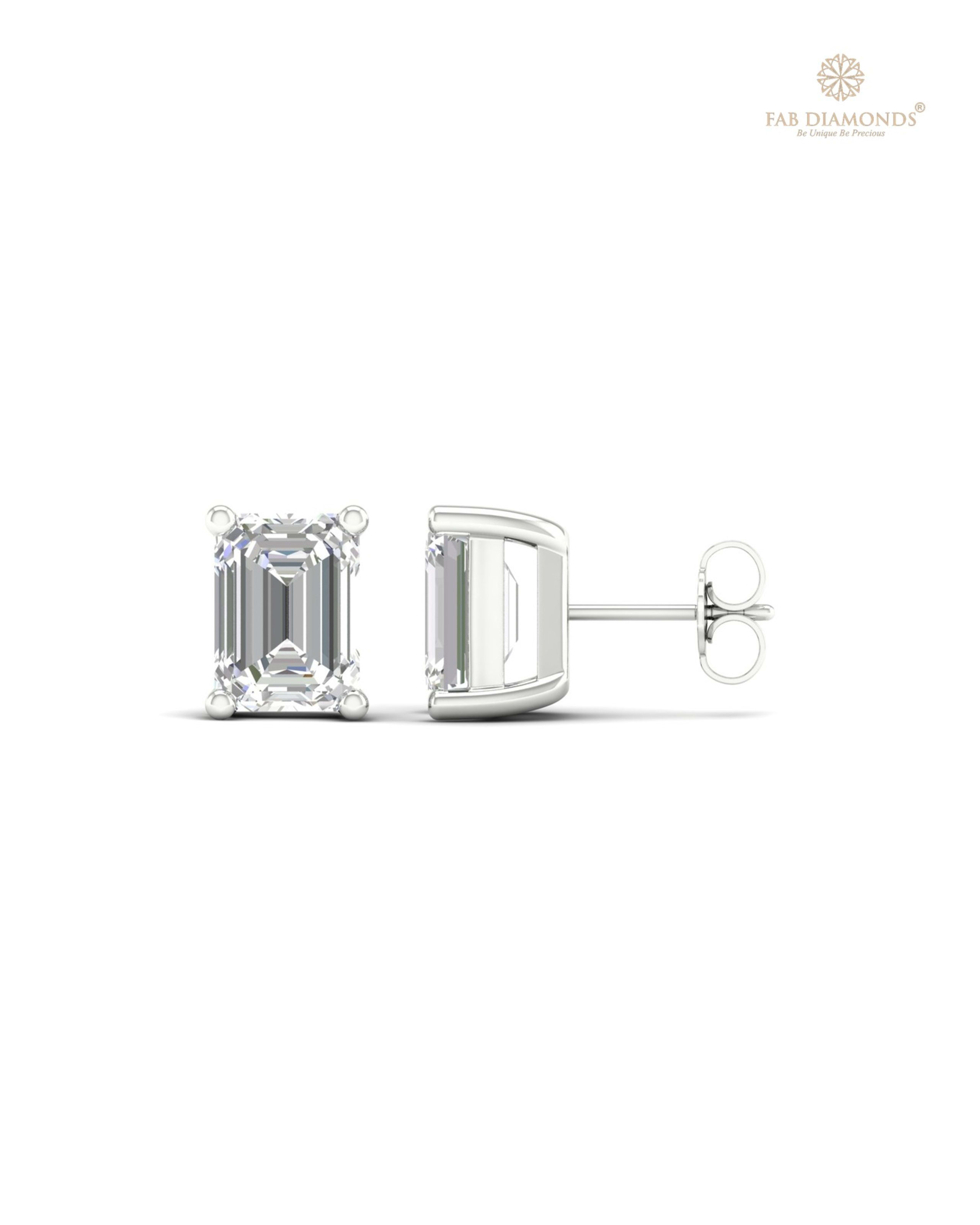 The ES10326 Classic Solitaire Diamond Studs (5.00 Cts) on white atelier plate with FAB hallmark