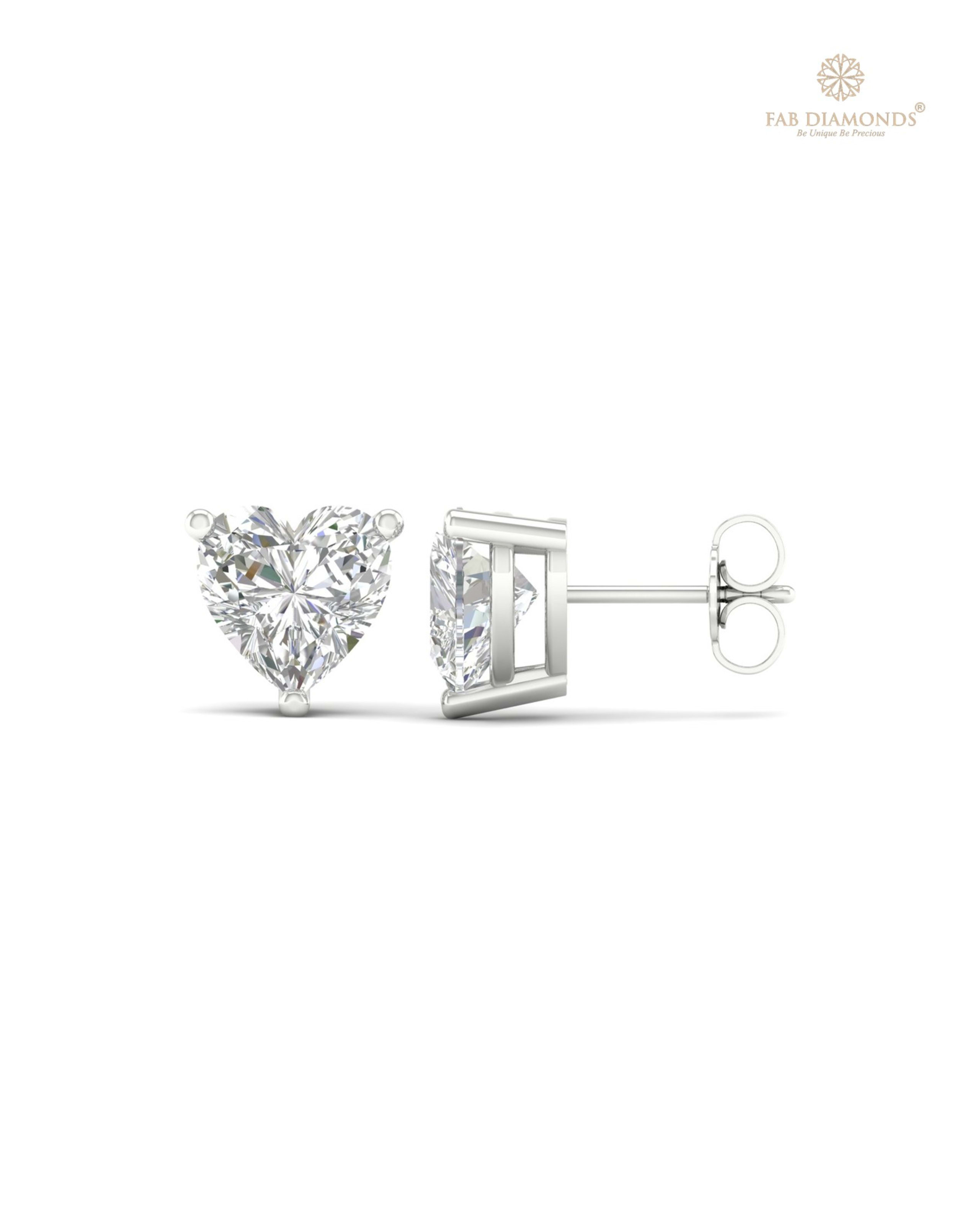 The ES10348 Classic Solitaire Diamond Studs (4.00 Cts) on white atelier plate with FAB hallmark