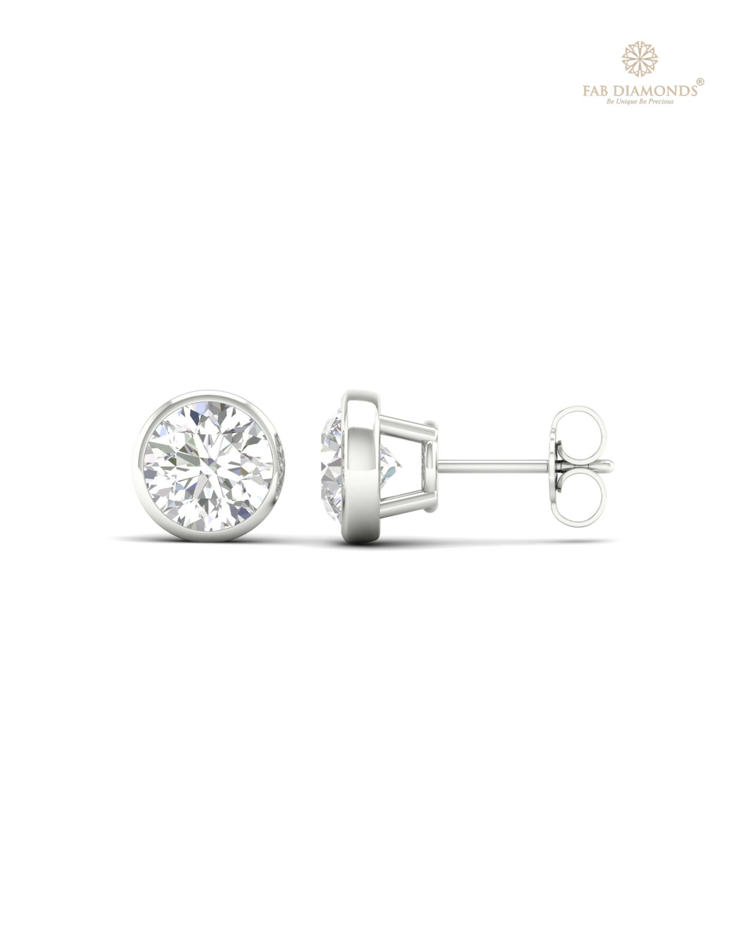The ES10429 Classic Solitaire Diamond Studs (3.50 Cts) on white atelier plate with FAB hallmark