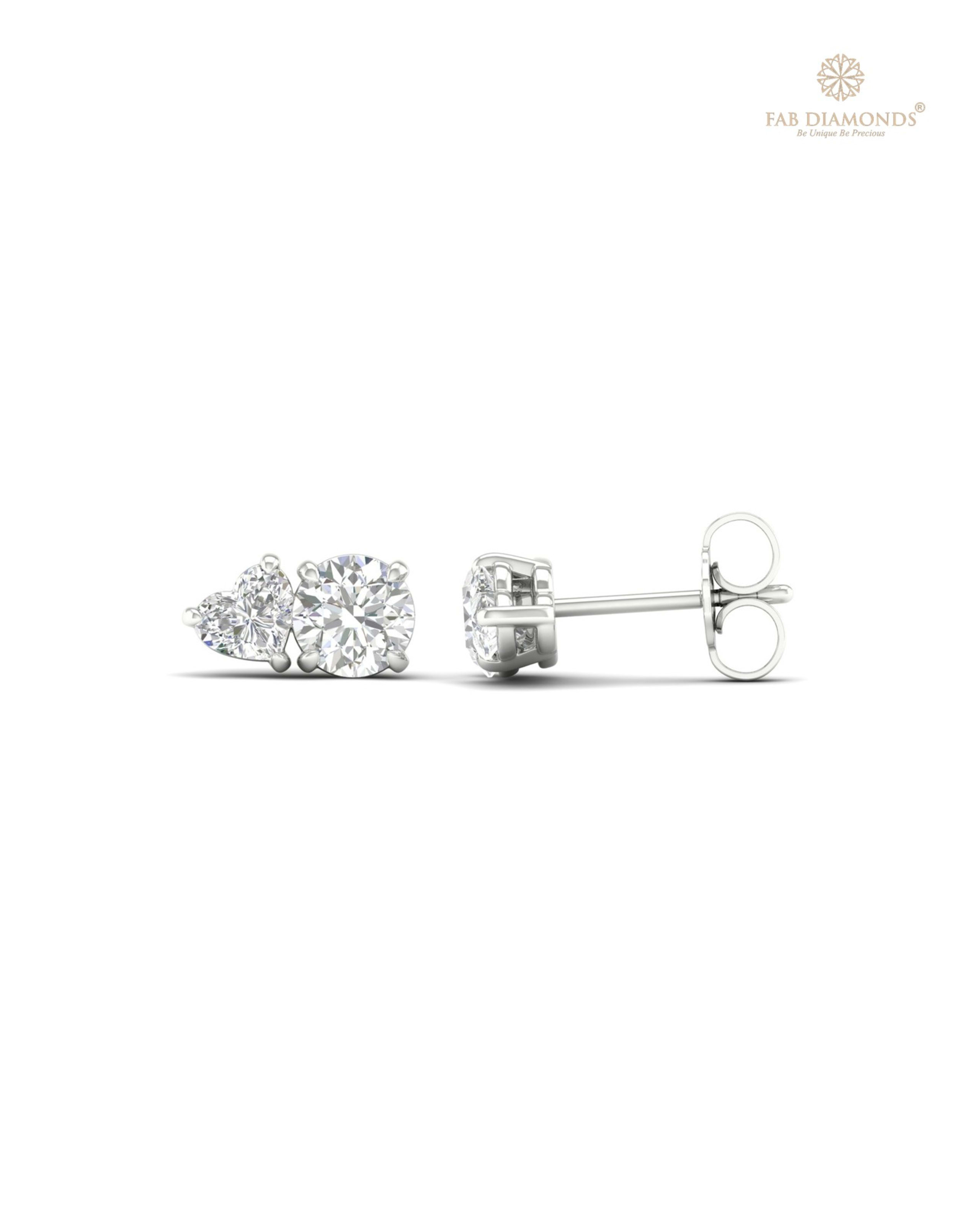 The ES10476 Diamond Halo Diamond Studs (1.40 Cts) on white atelier plate with FAB hallmark