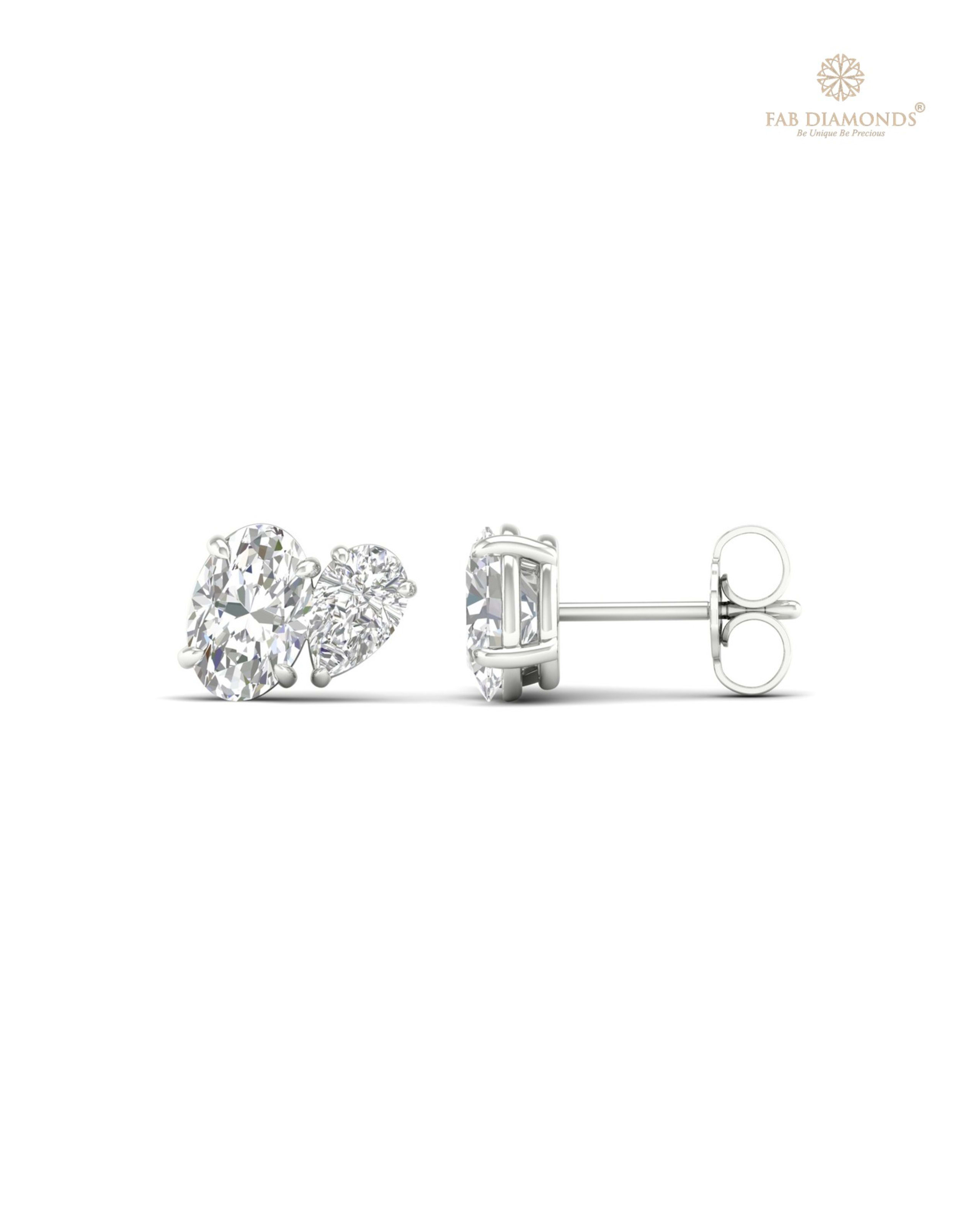 The ES10482 Diamond Halo Diamond Studs (1.70 Cts) on white atelier plate with FAB hallmark