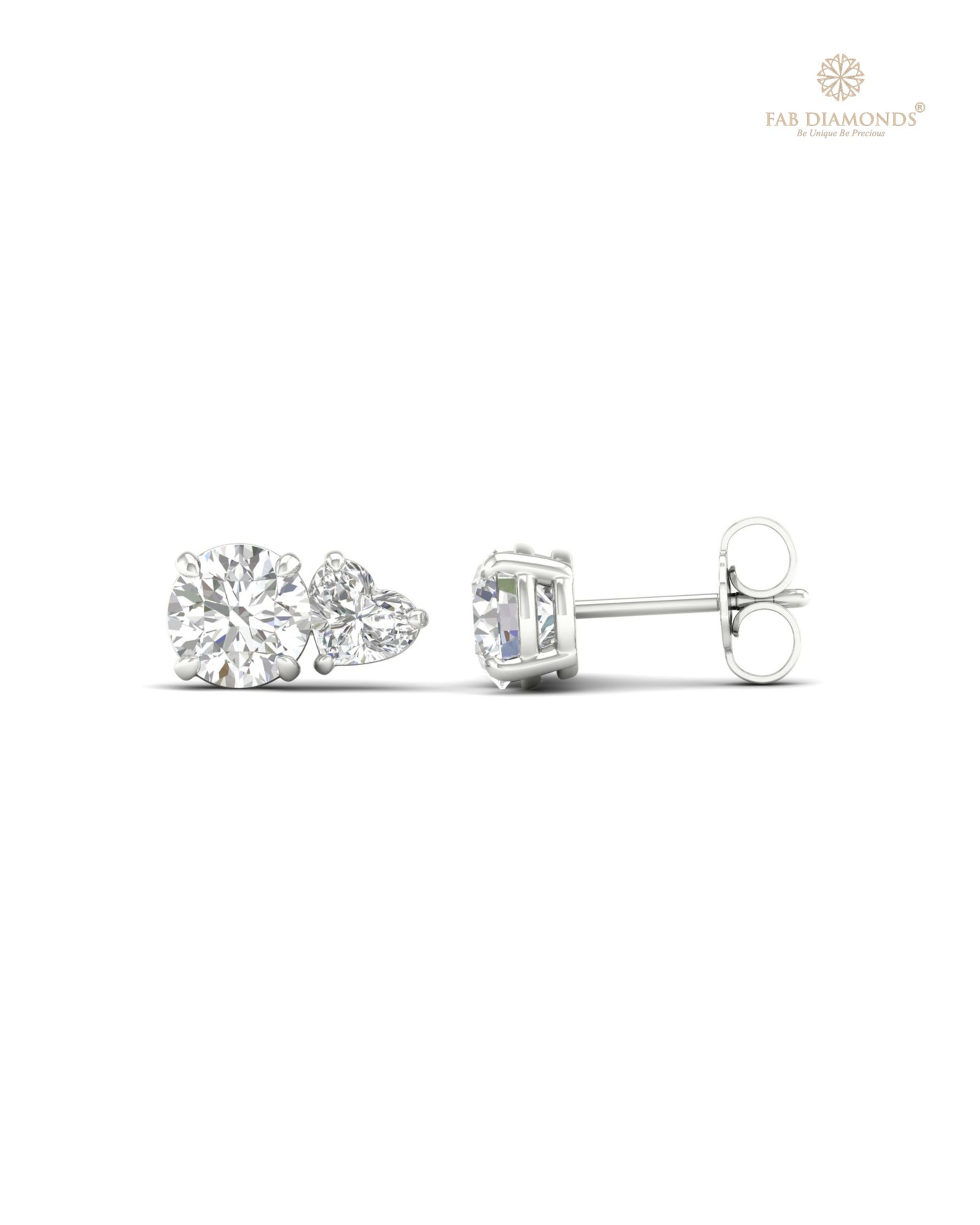 The ES10498 Diamond Halo Diamond Studs (2.00 Cts) on white atelier plate with FAB hallmark