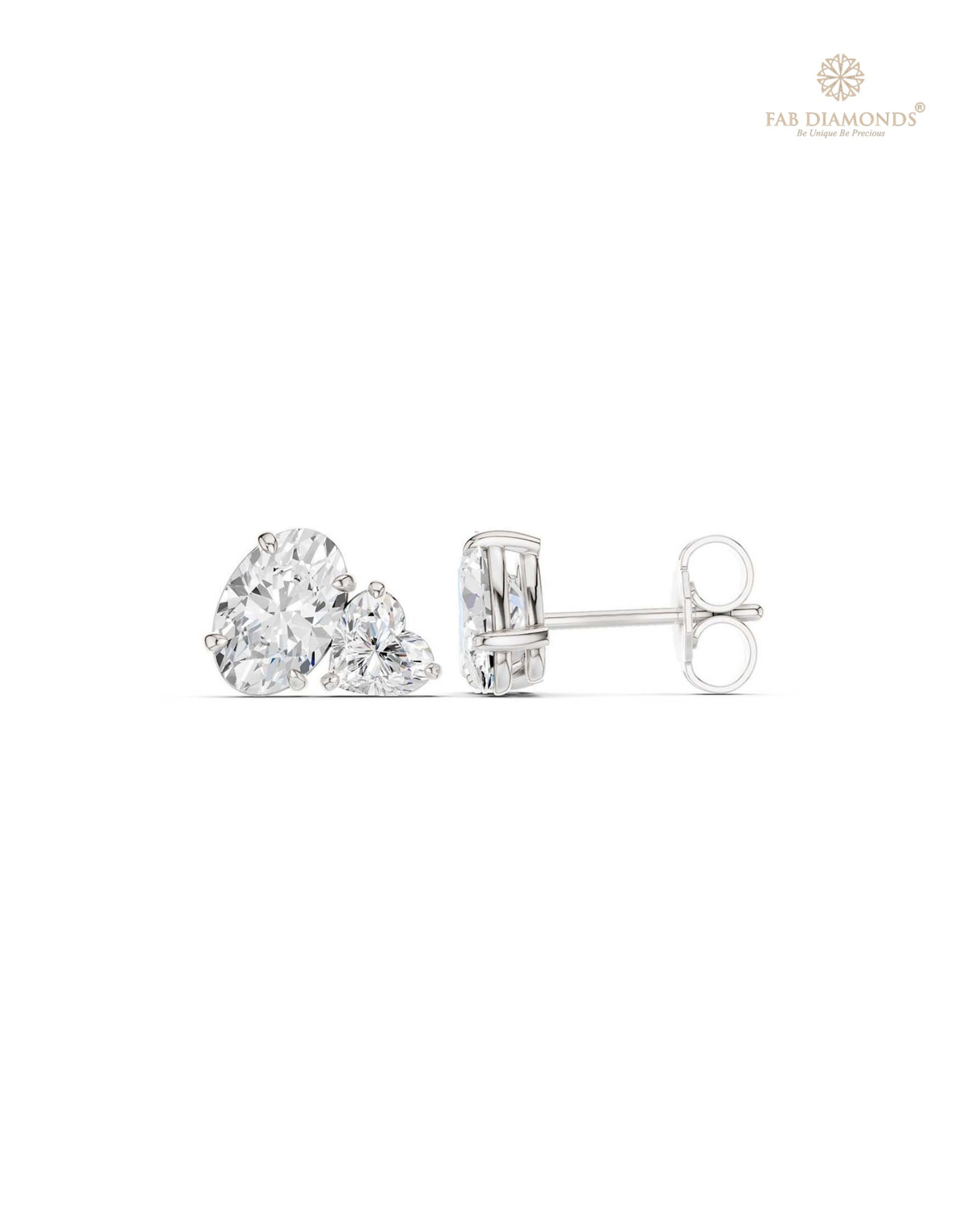 The ES10511 Diamond Halo Diamond Studs (2.16 Cts) on white atelier plate with FAB hallmark