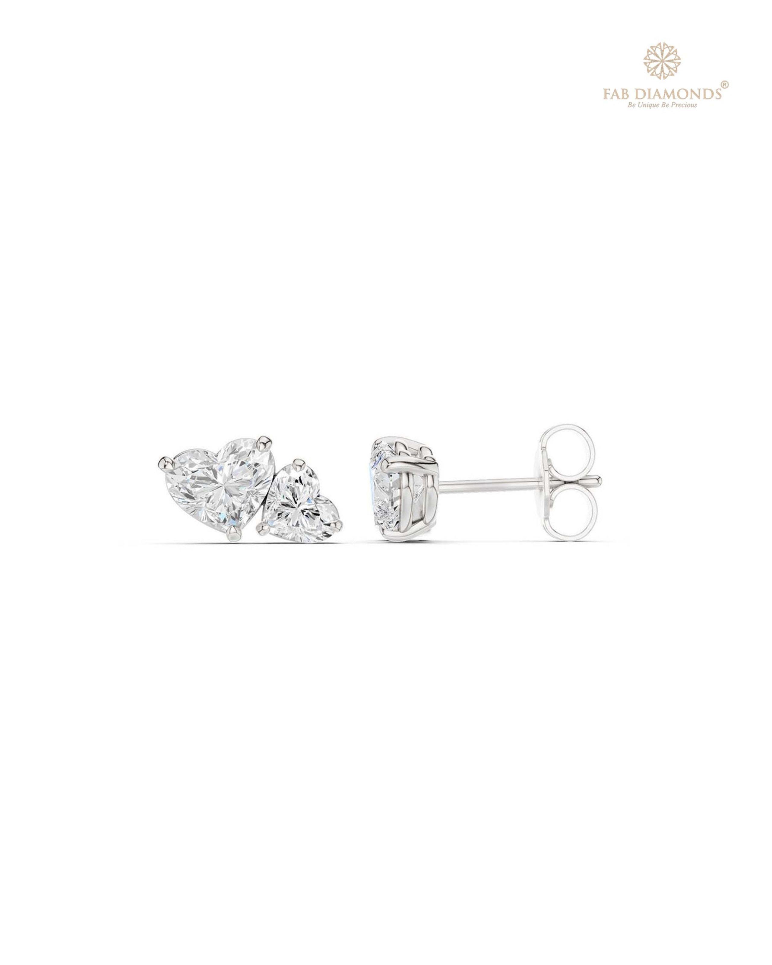The ES10513 Diamond Halo Diamond Studs (2.16 Cts) on white atelier plate with FAB hallmark