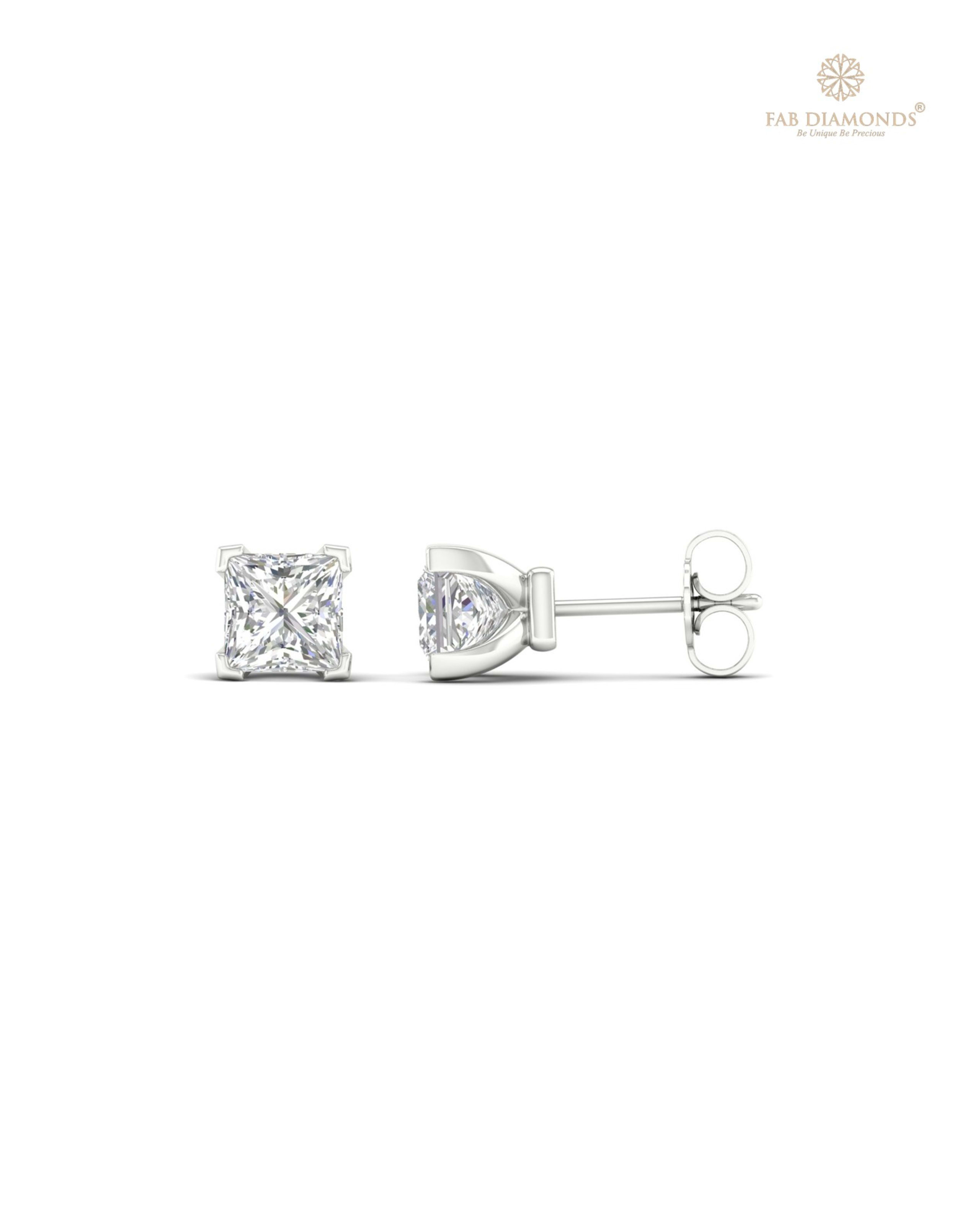 The ES10522 Classic Solitaire Diamond Studs (2.00 Cts) on white atelier plate with FAB hallmark