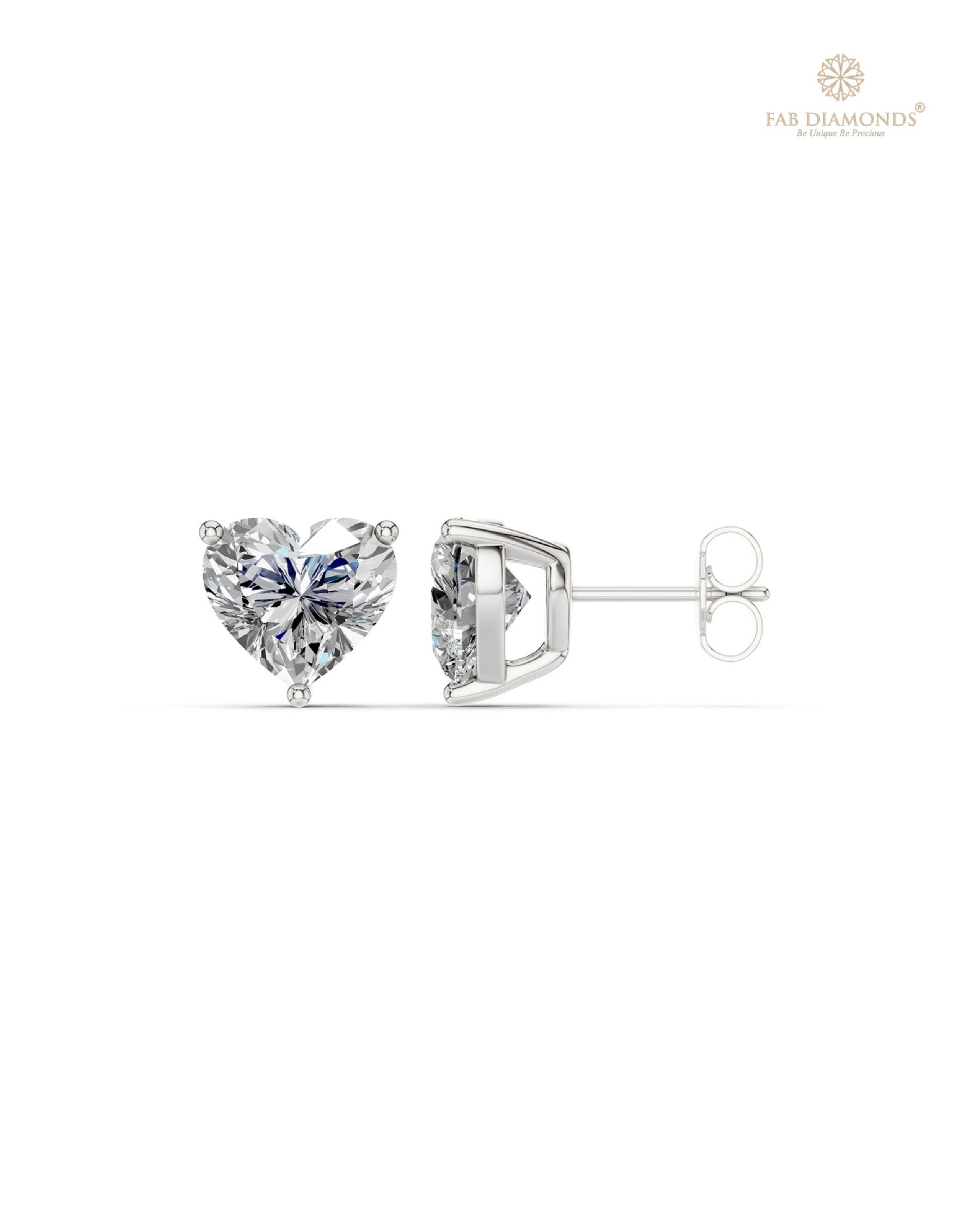 The ES10679 Classic Solitaire Diamond Studs (6.00 Cts) on white atelier plate with FAB hallmark