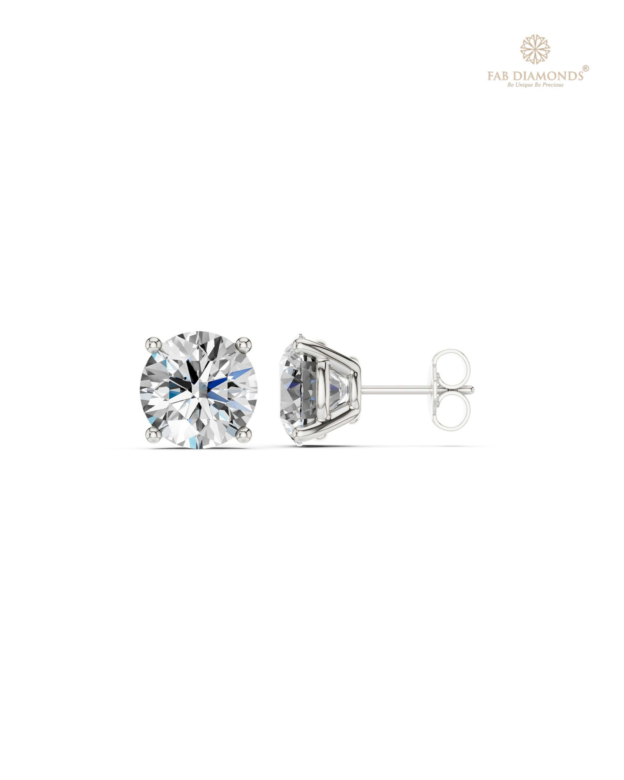 The ES10691 Classic Solitaire Diamond Studs (5.00 Cts) on white atelier plate with FAB hallmark