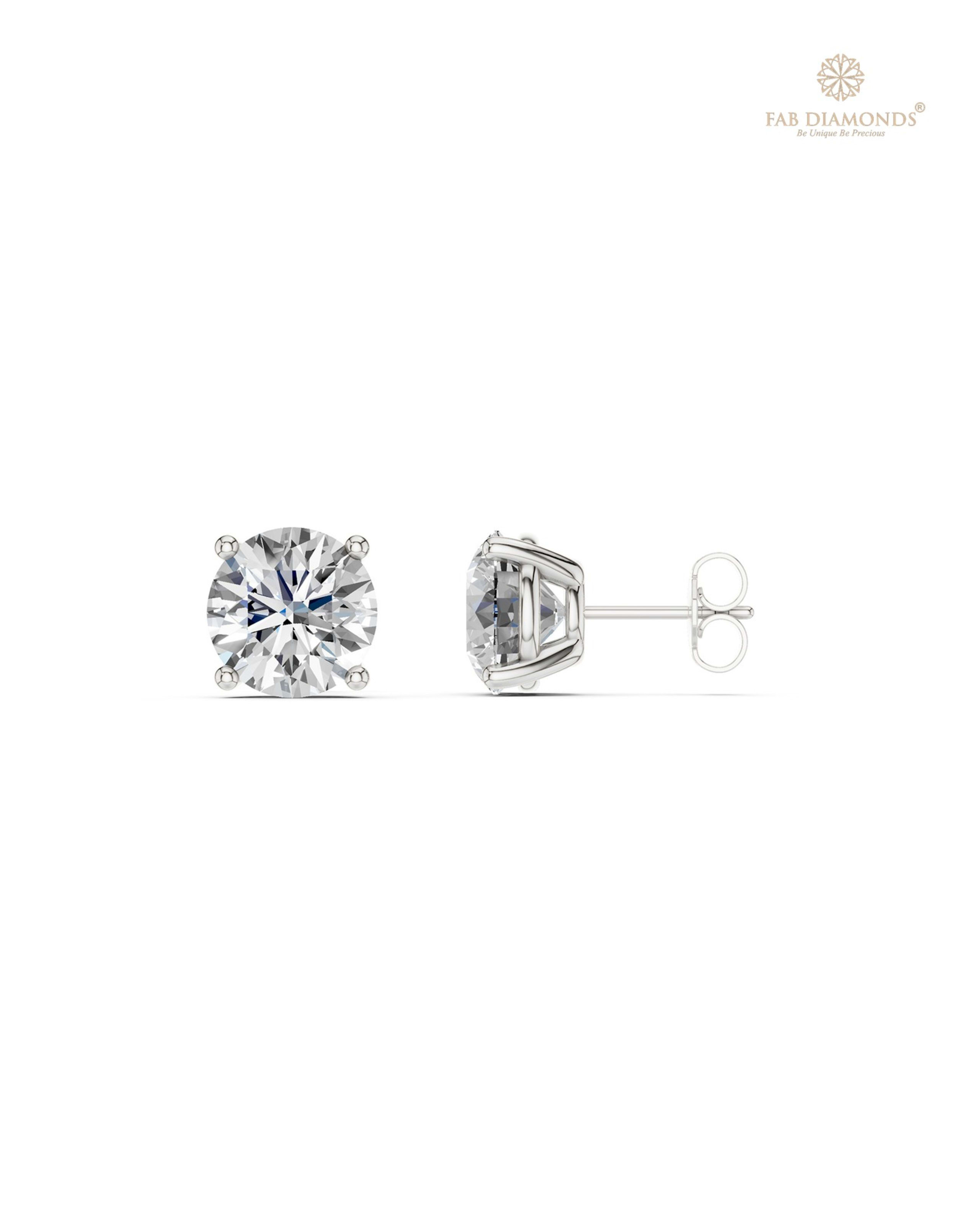 The ES10692 Classic Solitaire Diamond Studs (6.00 Cts) on white atelier plate with FAB hallmark